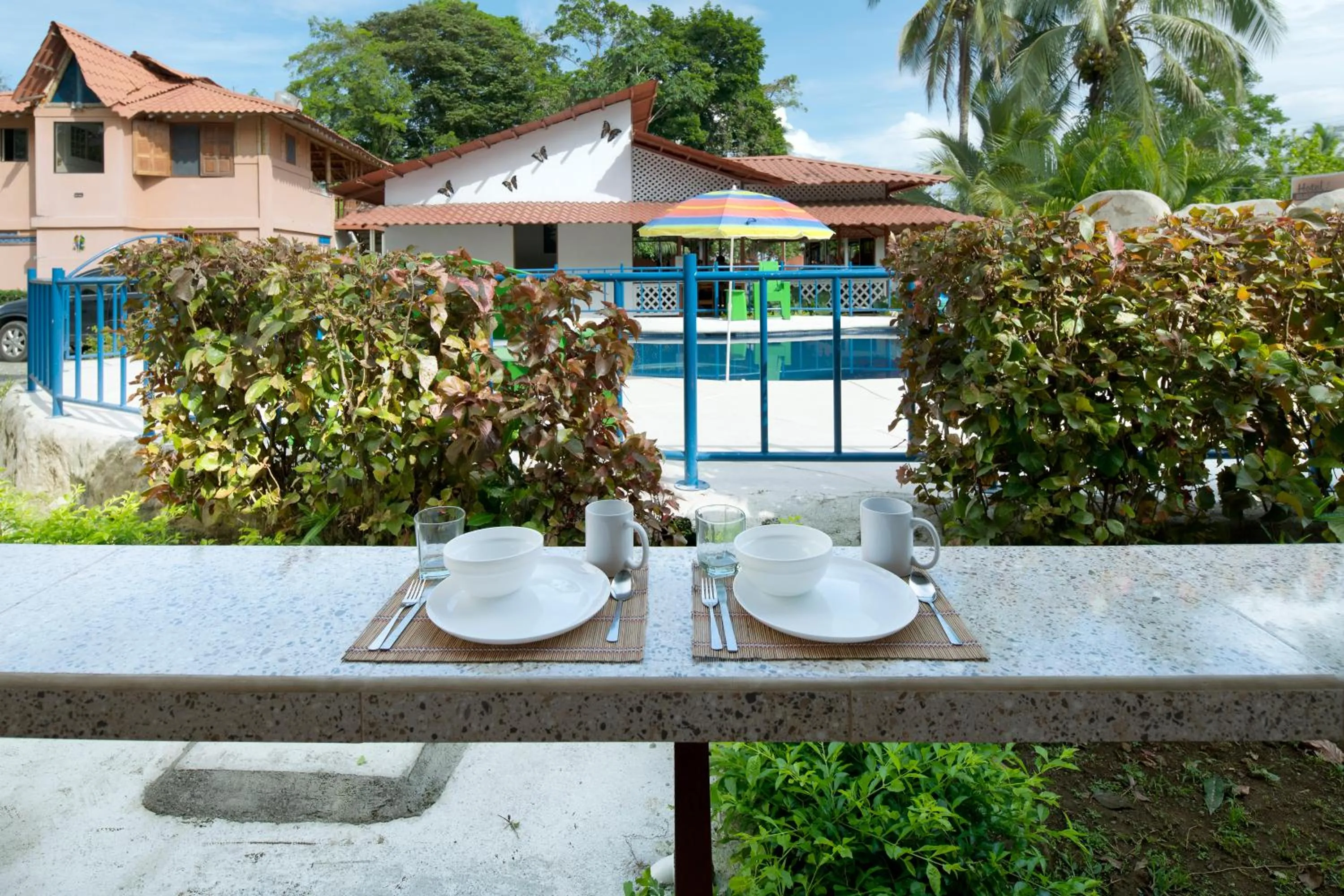 Dining area in Pangea Lodge with Shared Pool at the Heart of Manzanillo