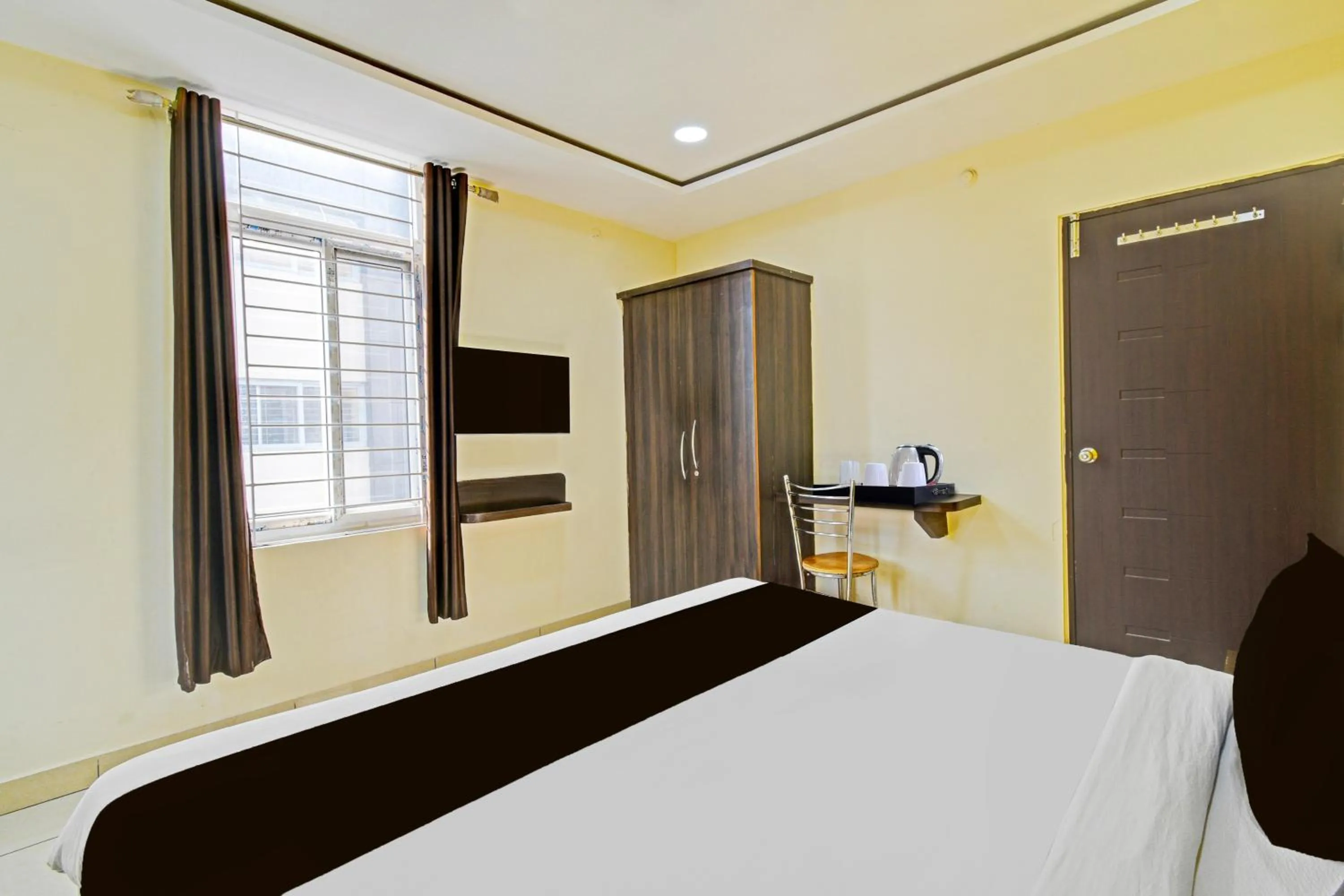 Bedroom, Bed in Super Hotel O Kondapur Hyderabad Formerly Dunes Inn