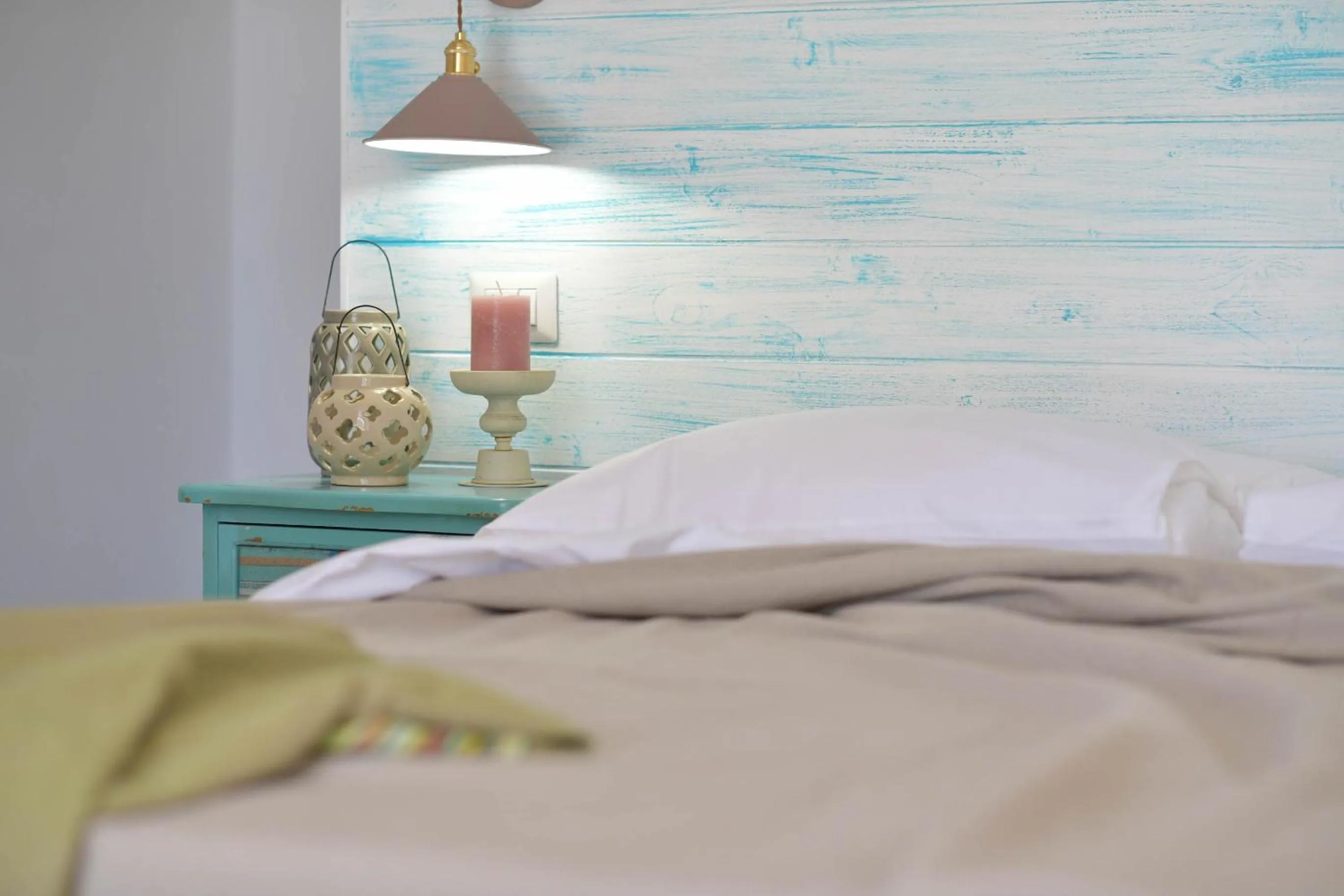 Decorative detail, Bed in LUCCICAMARE family-run BeB