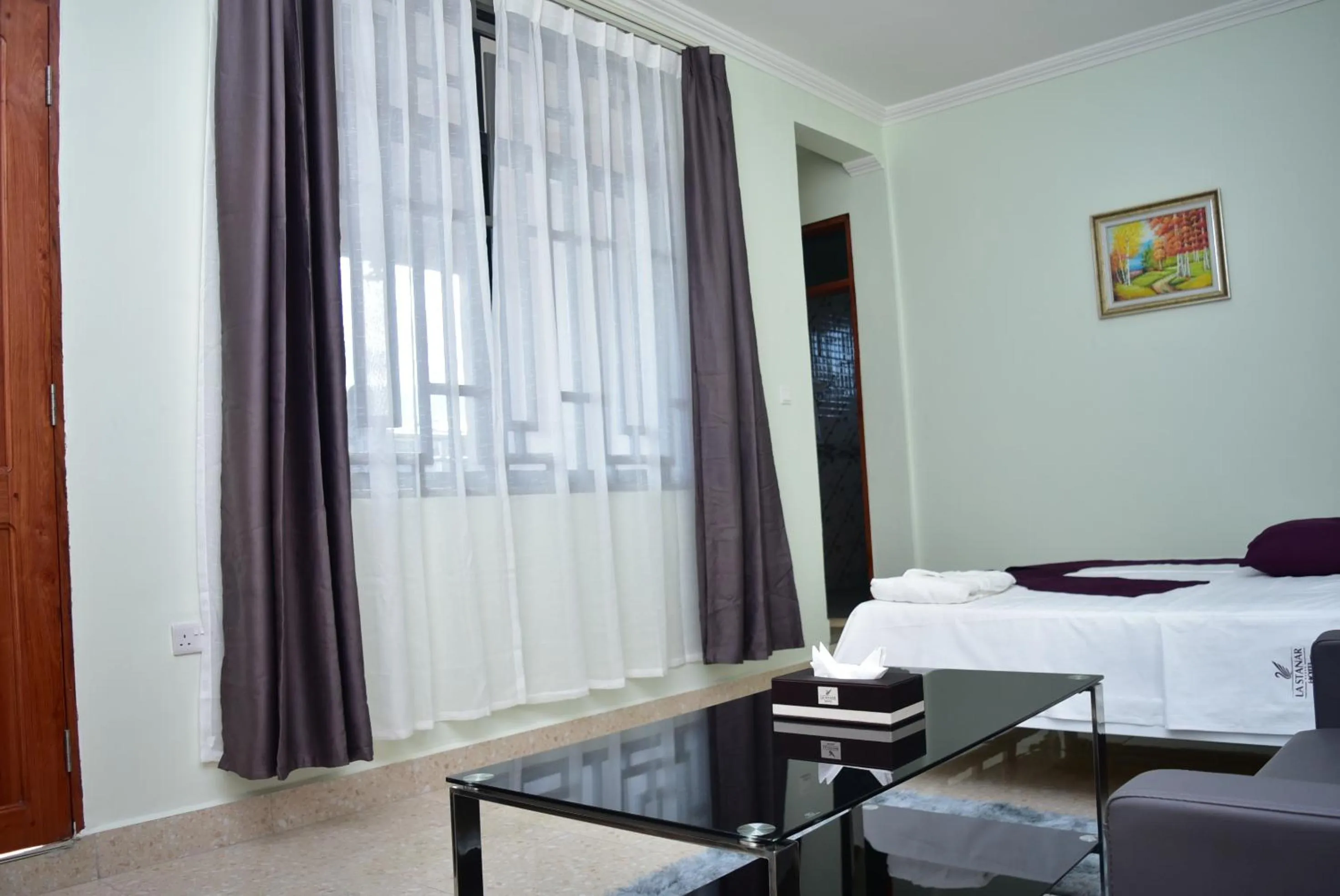 Bed in La Stanar Hotel