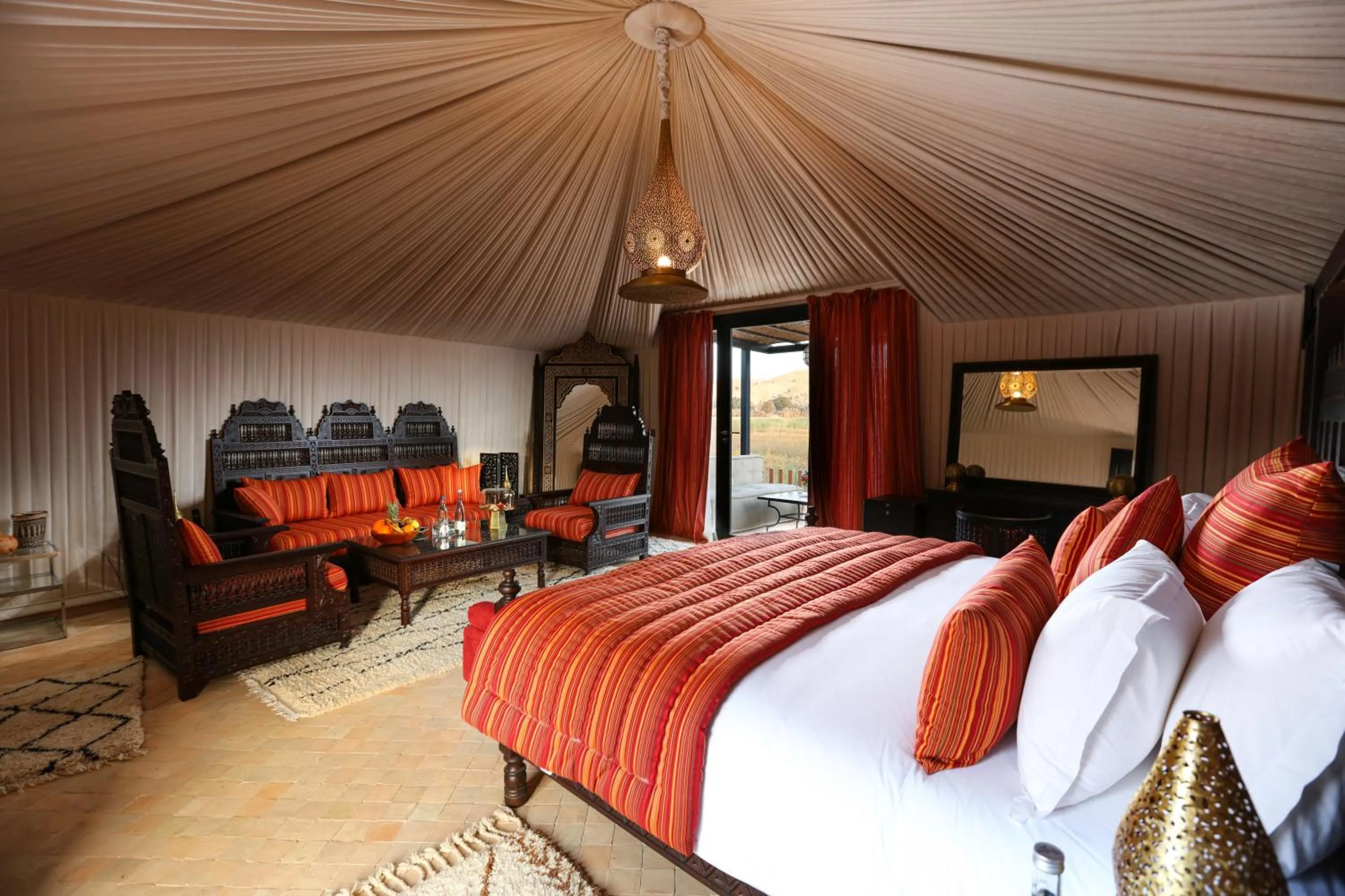 Bed in Kalyptus Luxury Camp