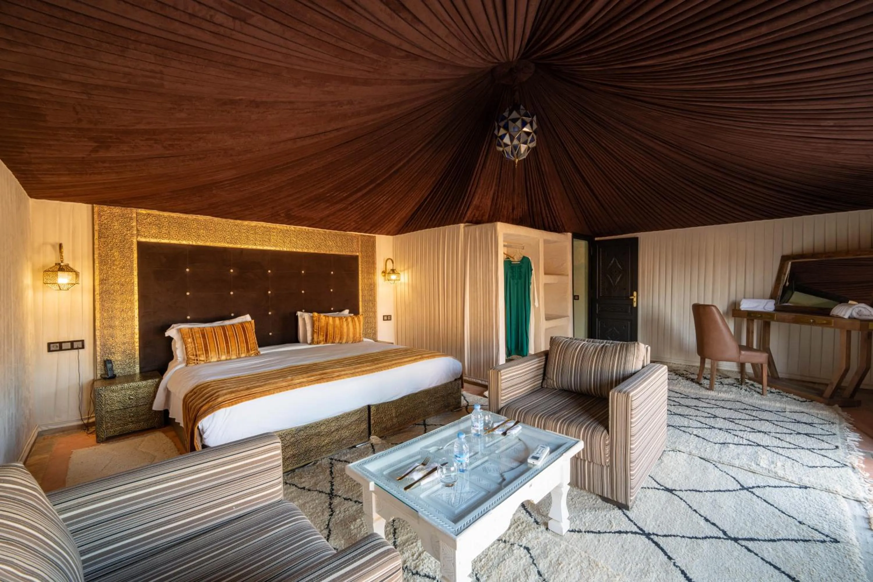 Bed in Kalyptus Luxury Camp