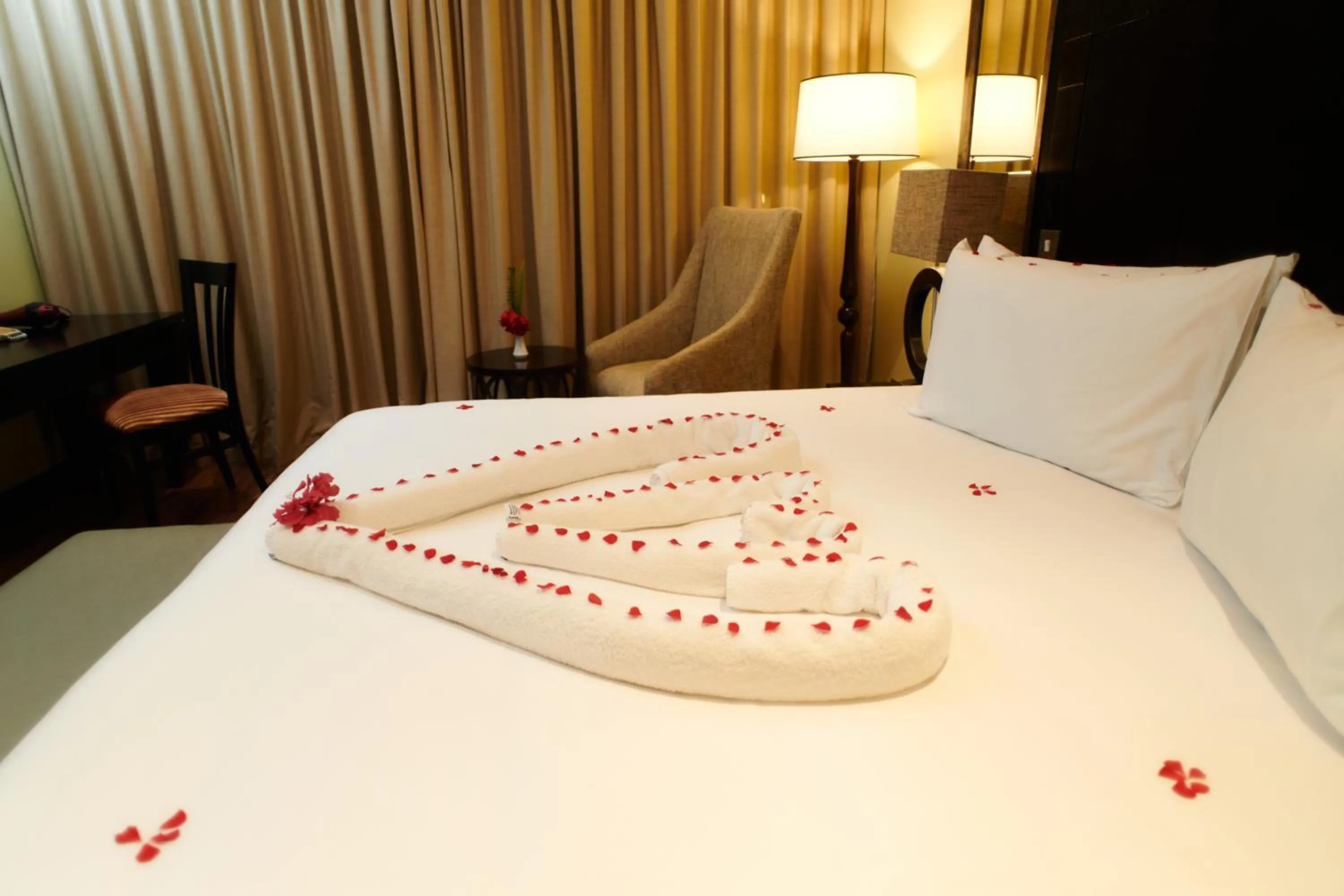 Bed in Mount Meru Hotel