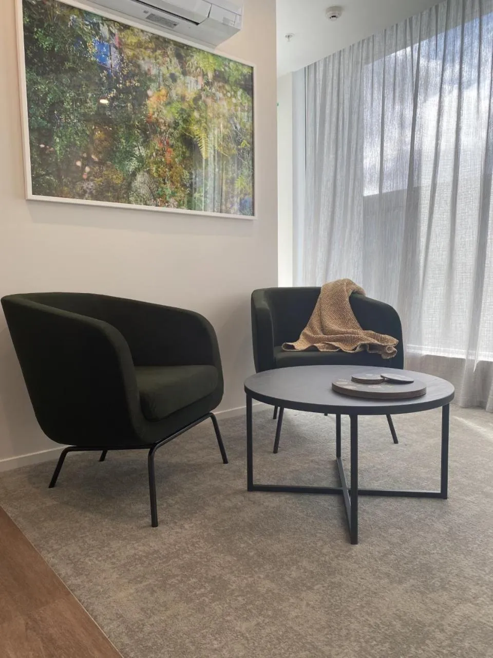 Seating area in Wyndham Garden Christchurch Kilmore Street