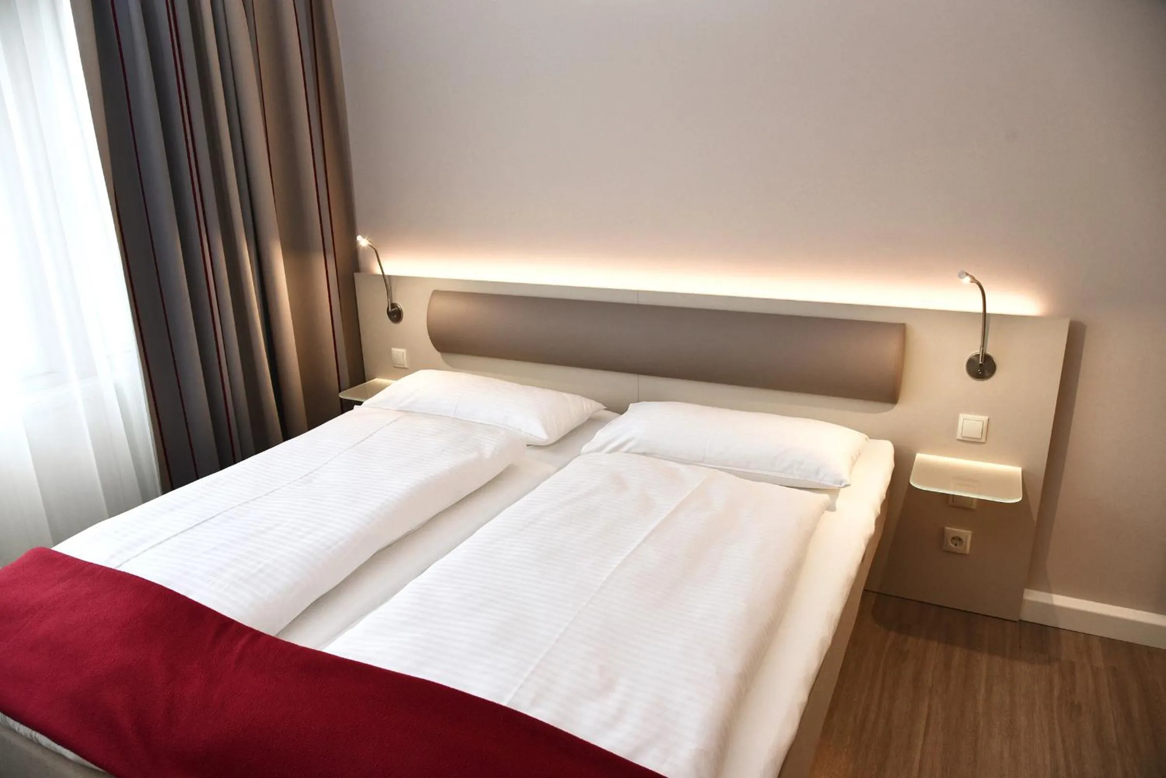 Photo of the whole room, Bed in Hotel Bonn City