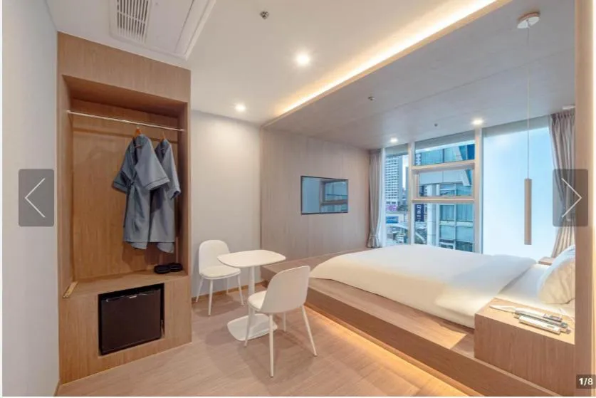 Bed in De Homme Hotel