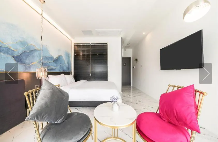 Bed in De Homme Hotel