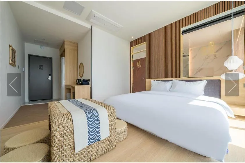 Bed in De Homme Hotel