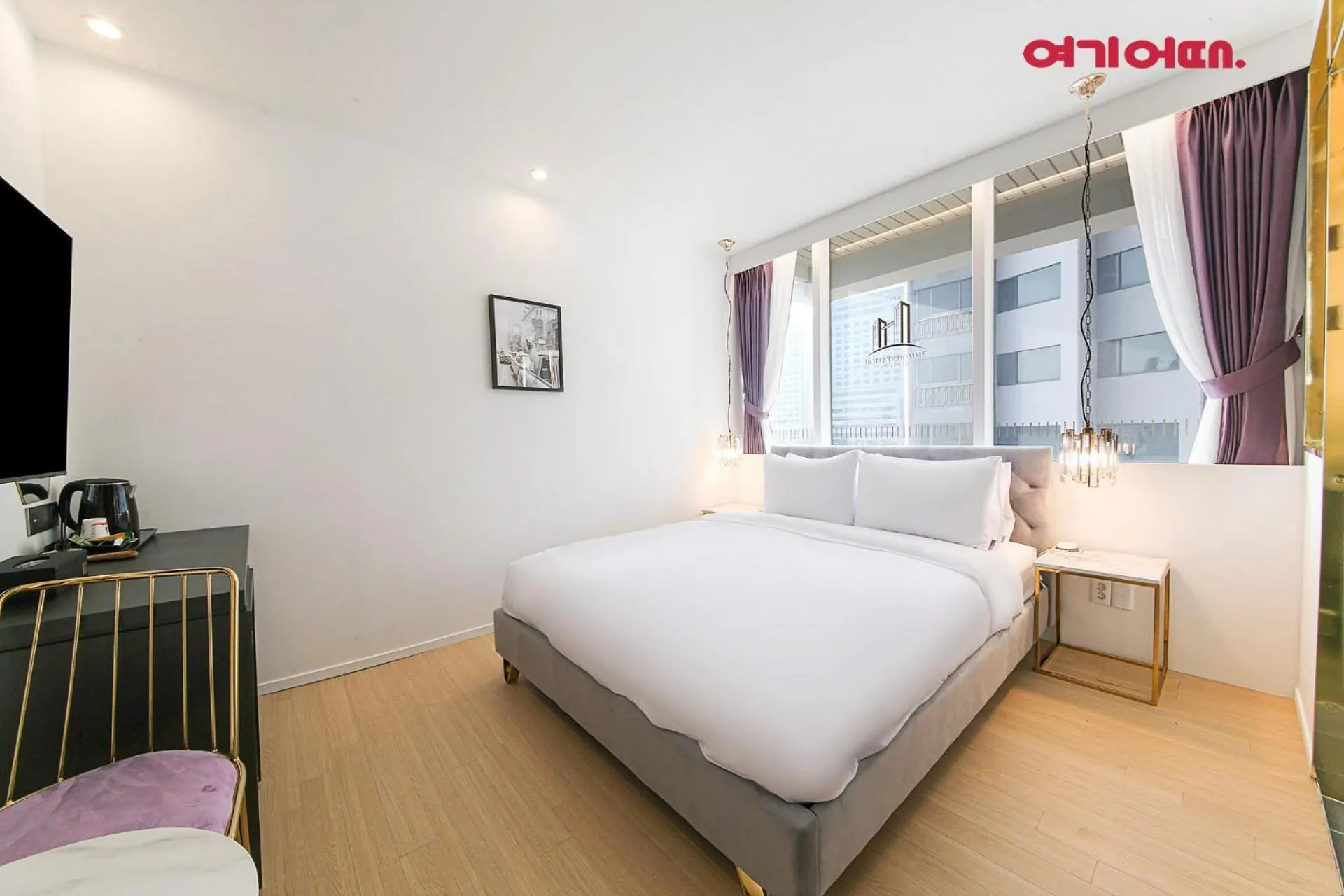 Bed in De Homme Hotel