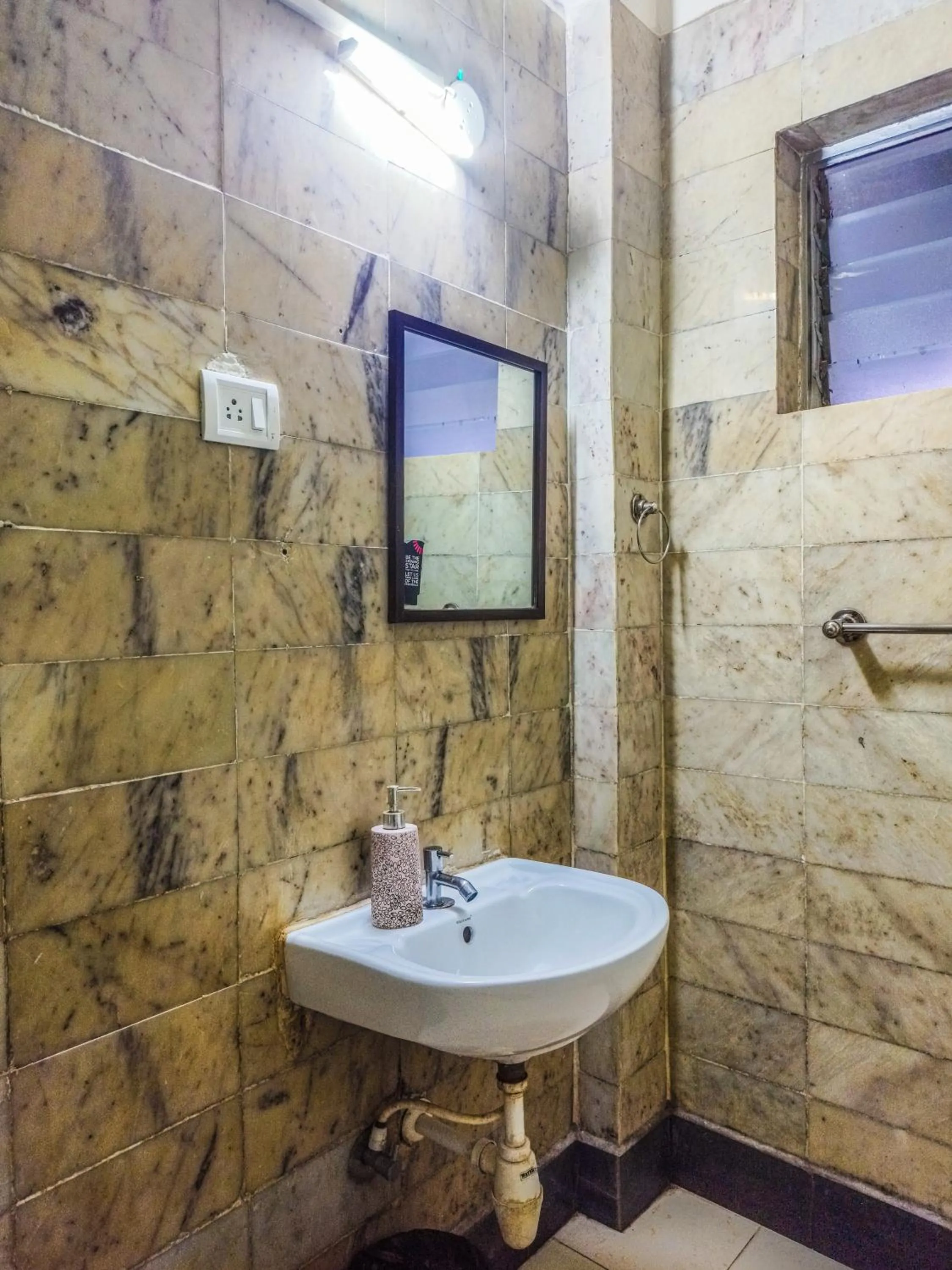 Bathroom in Olive Zip Calangute Mira by Embassy Group