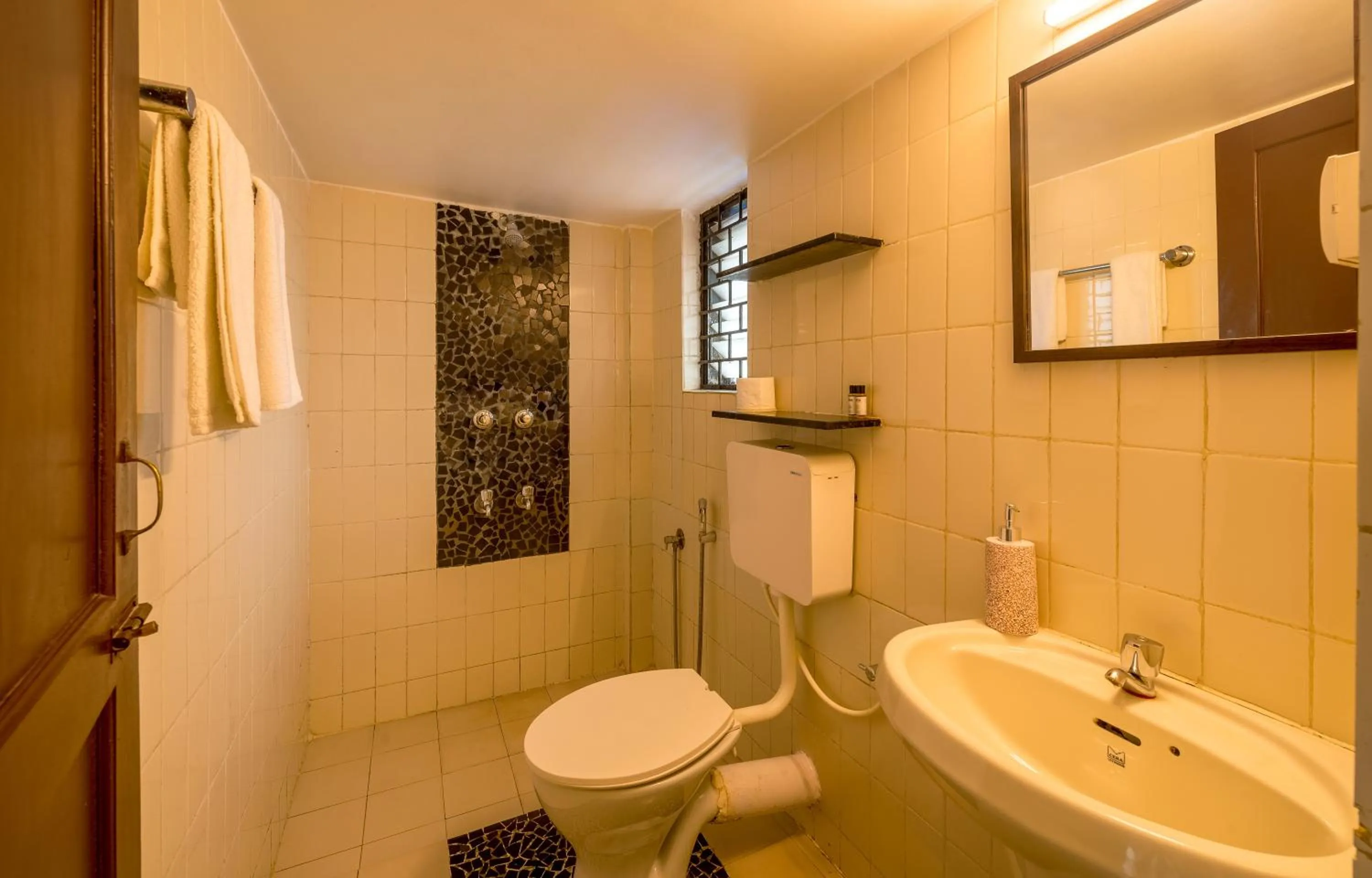 Bathroom in Olive Zip Calangute Mira by Embassy Group