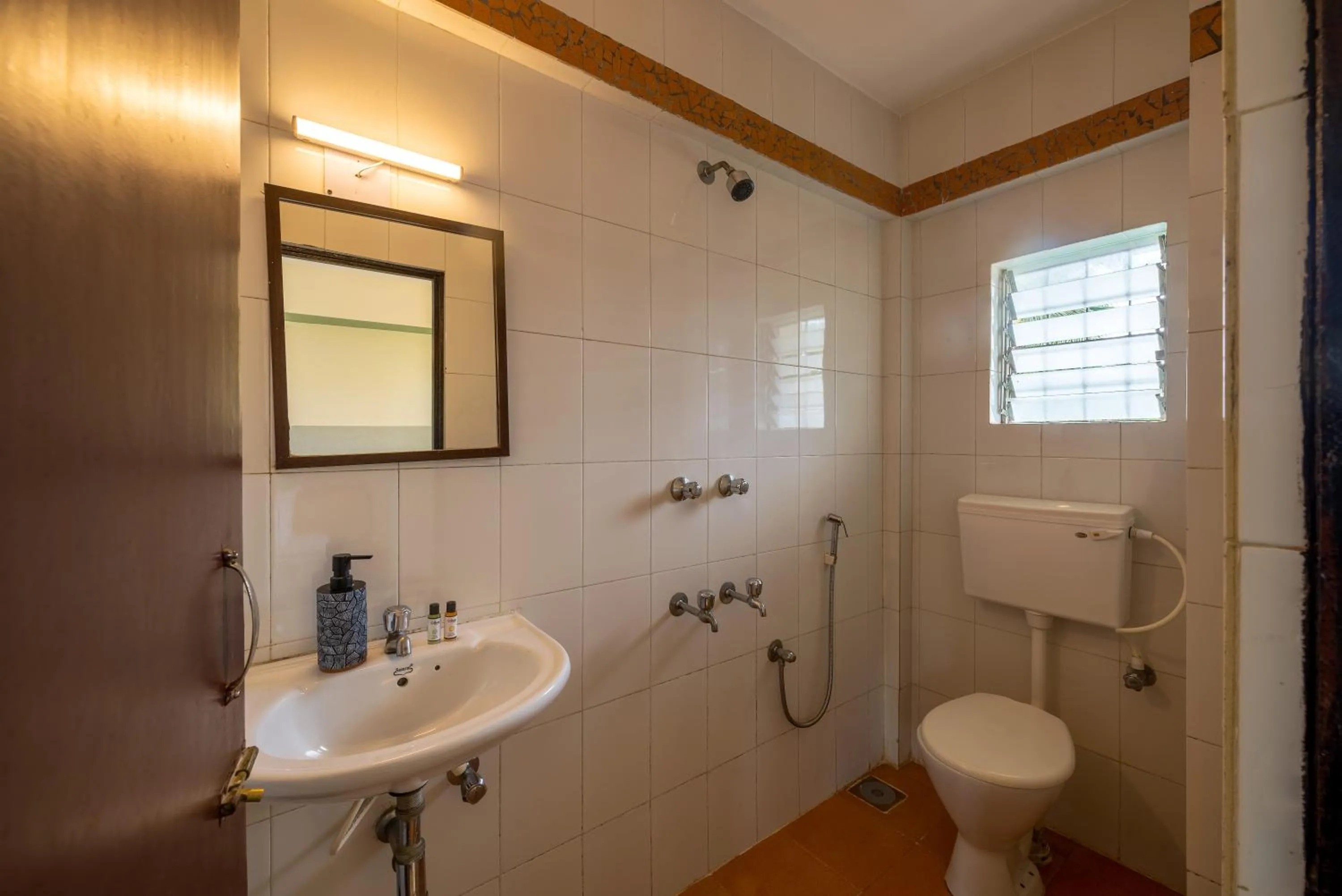 Bathroom in Olive Zip Calangute Mira by Embassy Group