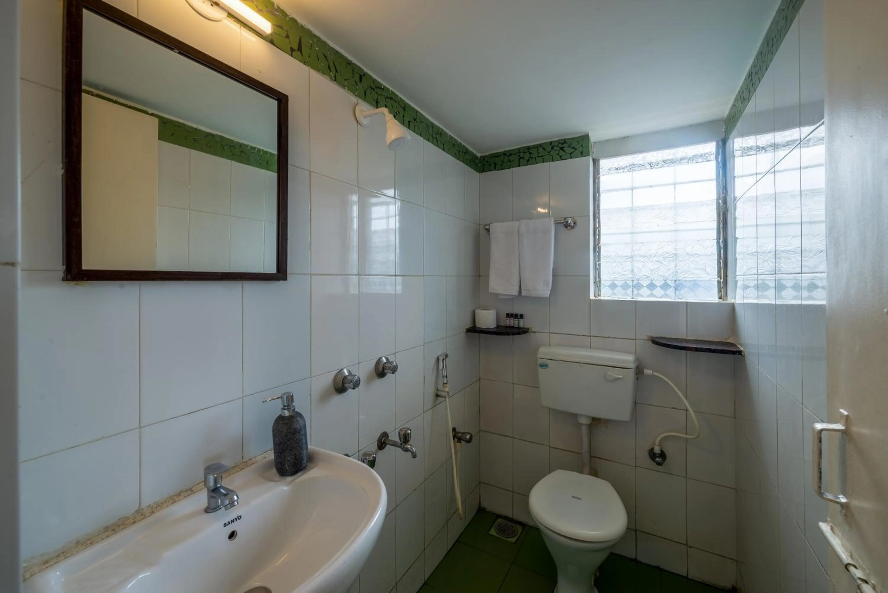 Bathroom in Olive Zip Calangute Mira by Embassy Group