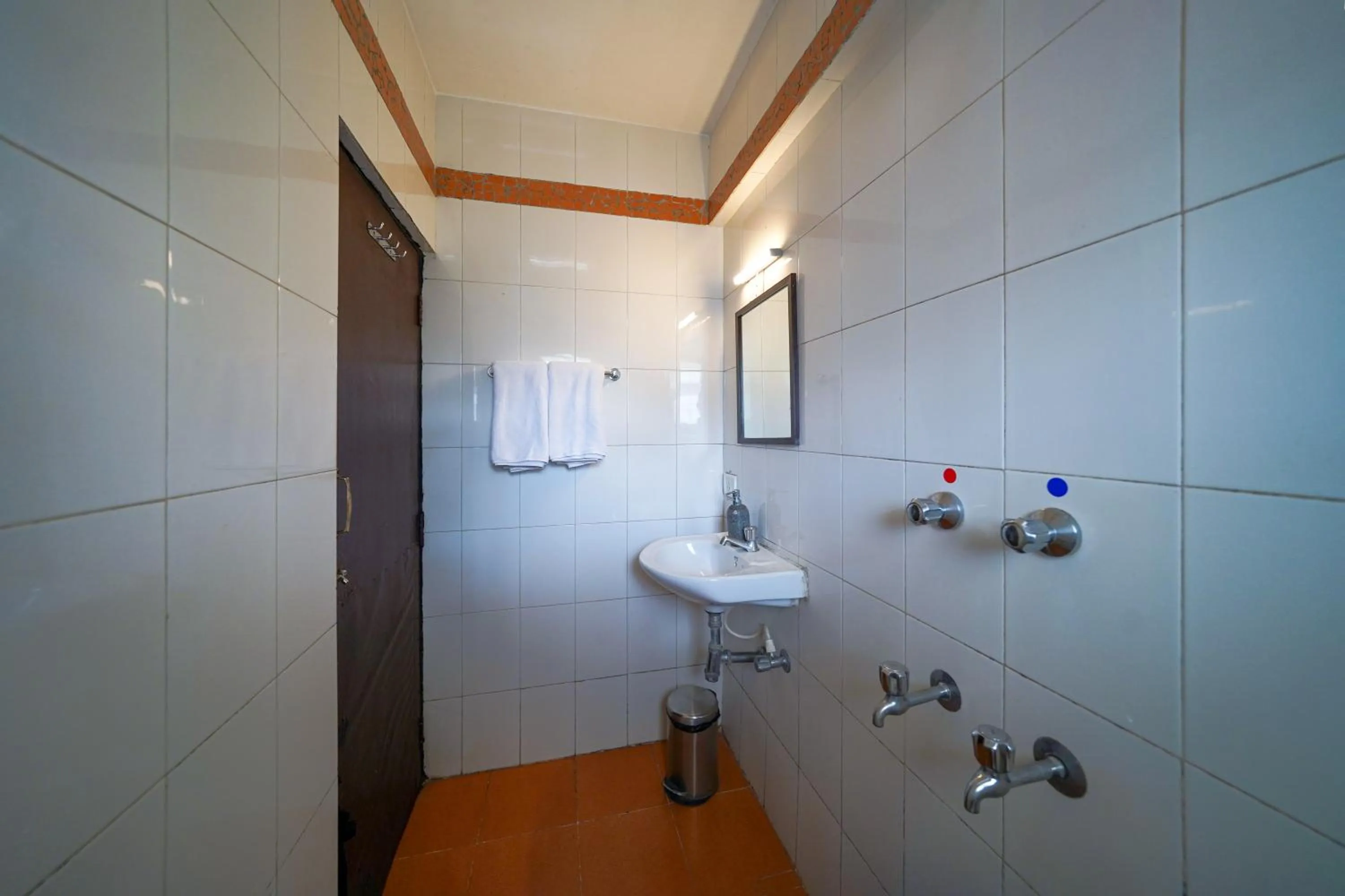 Bathroom in Olive Zip Calangute Mira by Embassy Group