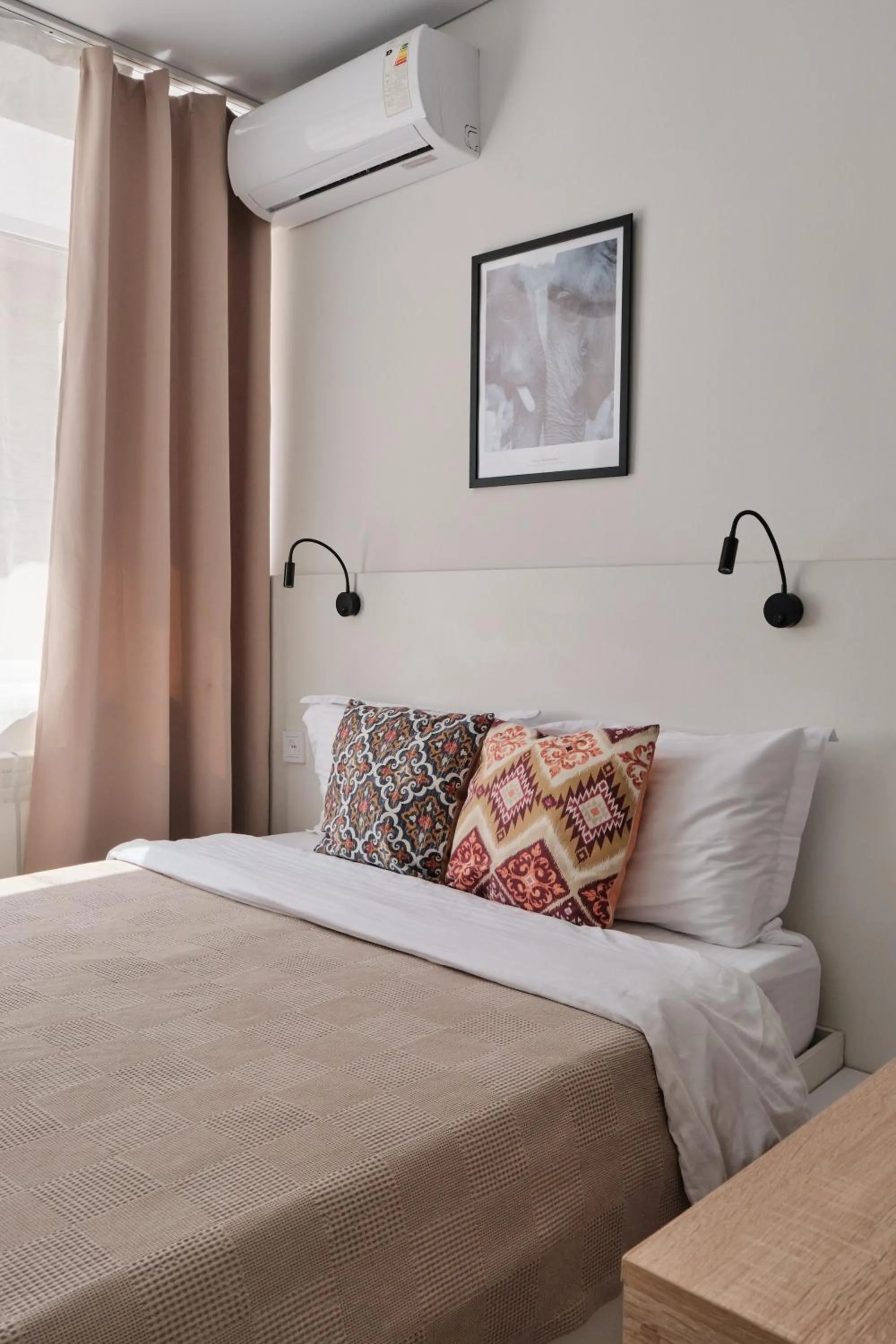 Bed in Seven City Apartments