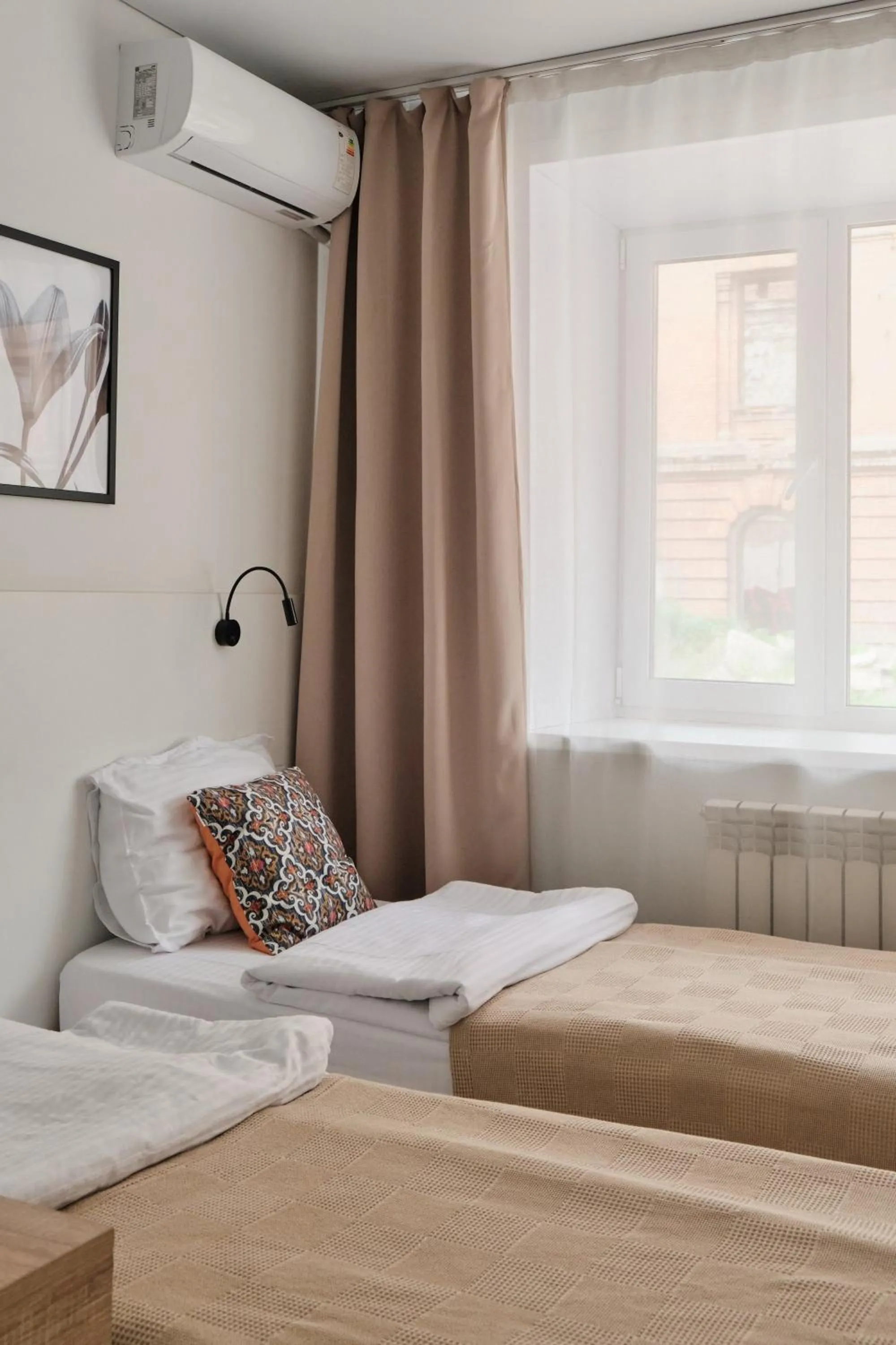 Bed in Seven City Apartments