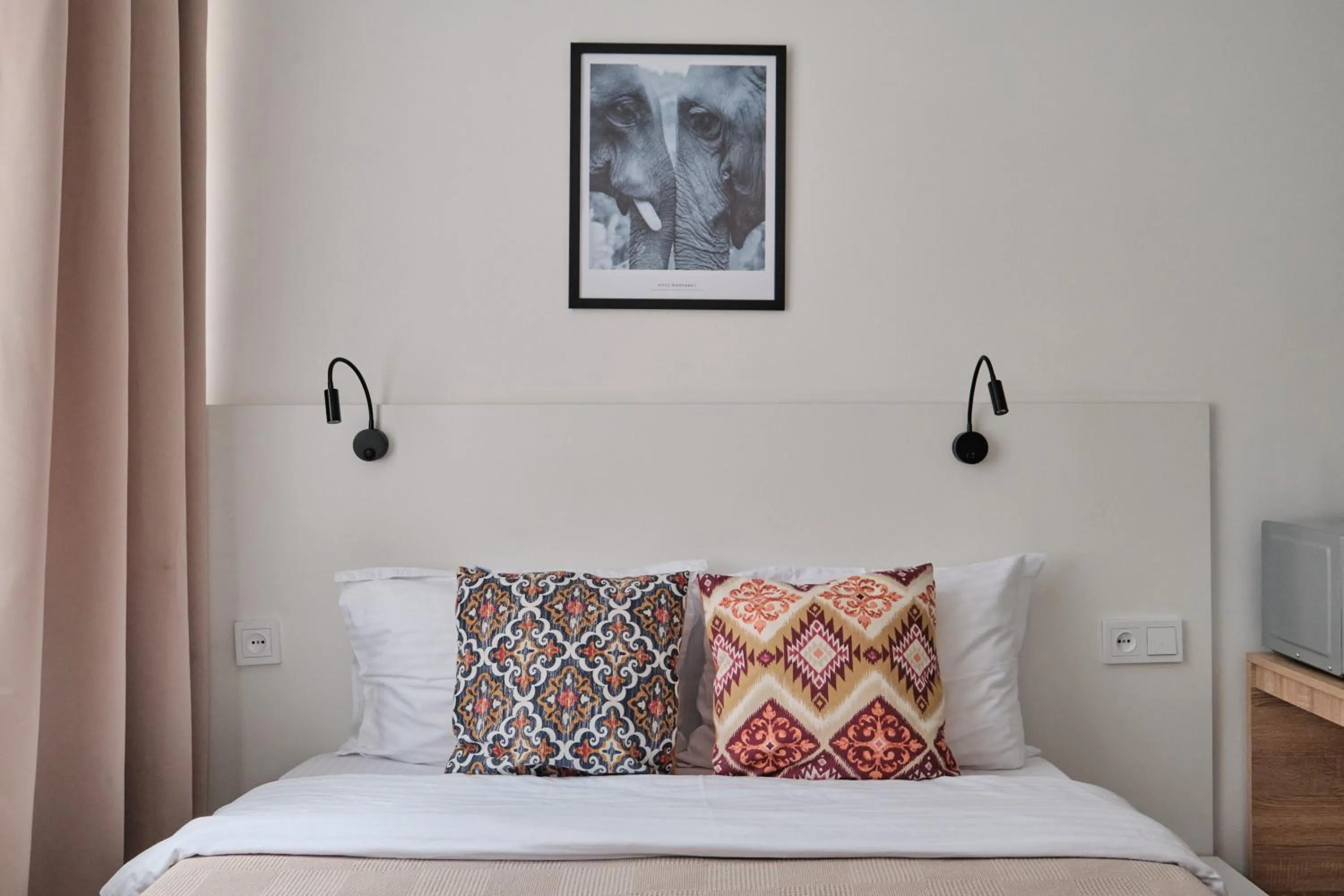 Bed in Seven City Apartments