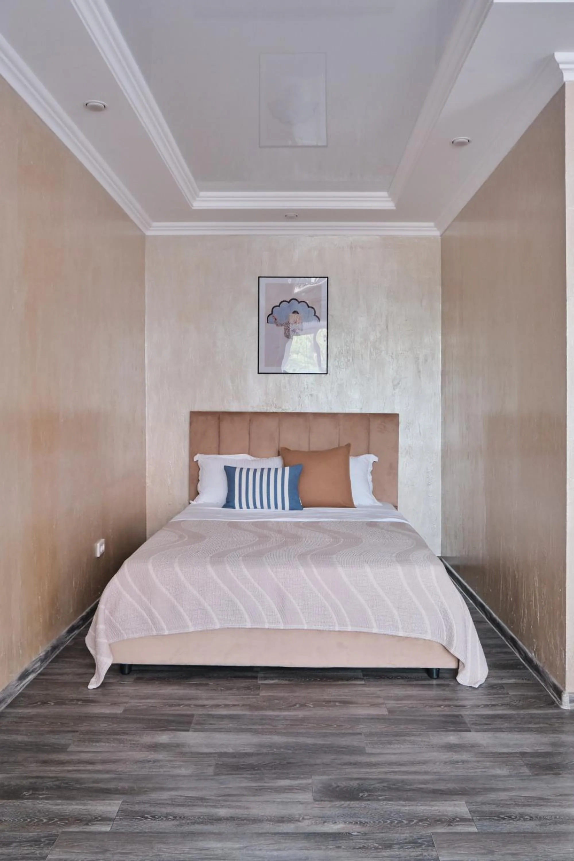 Bed in Seven City Apartments