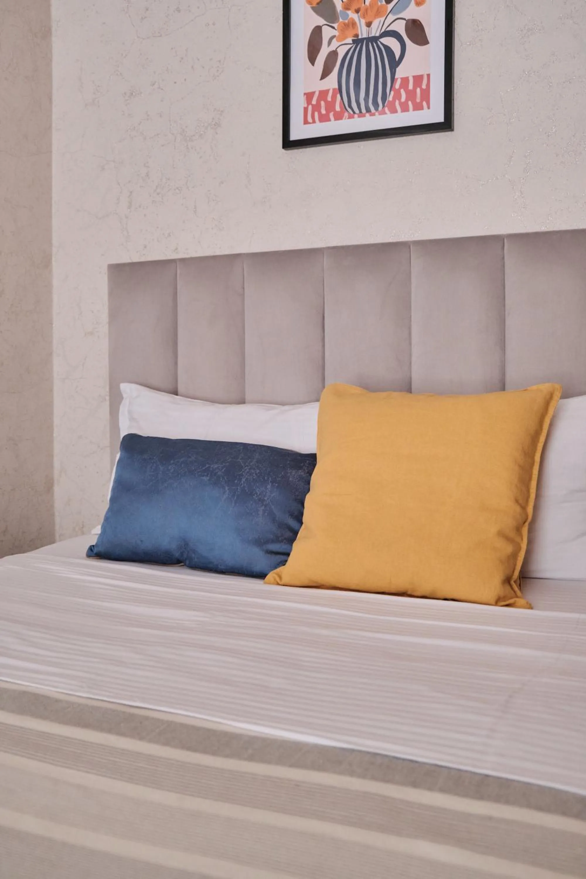 Bed in Seven City Apartments