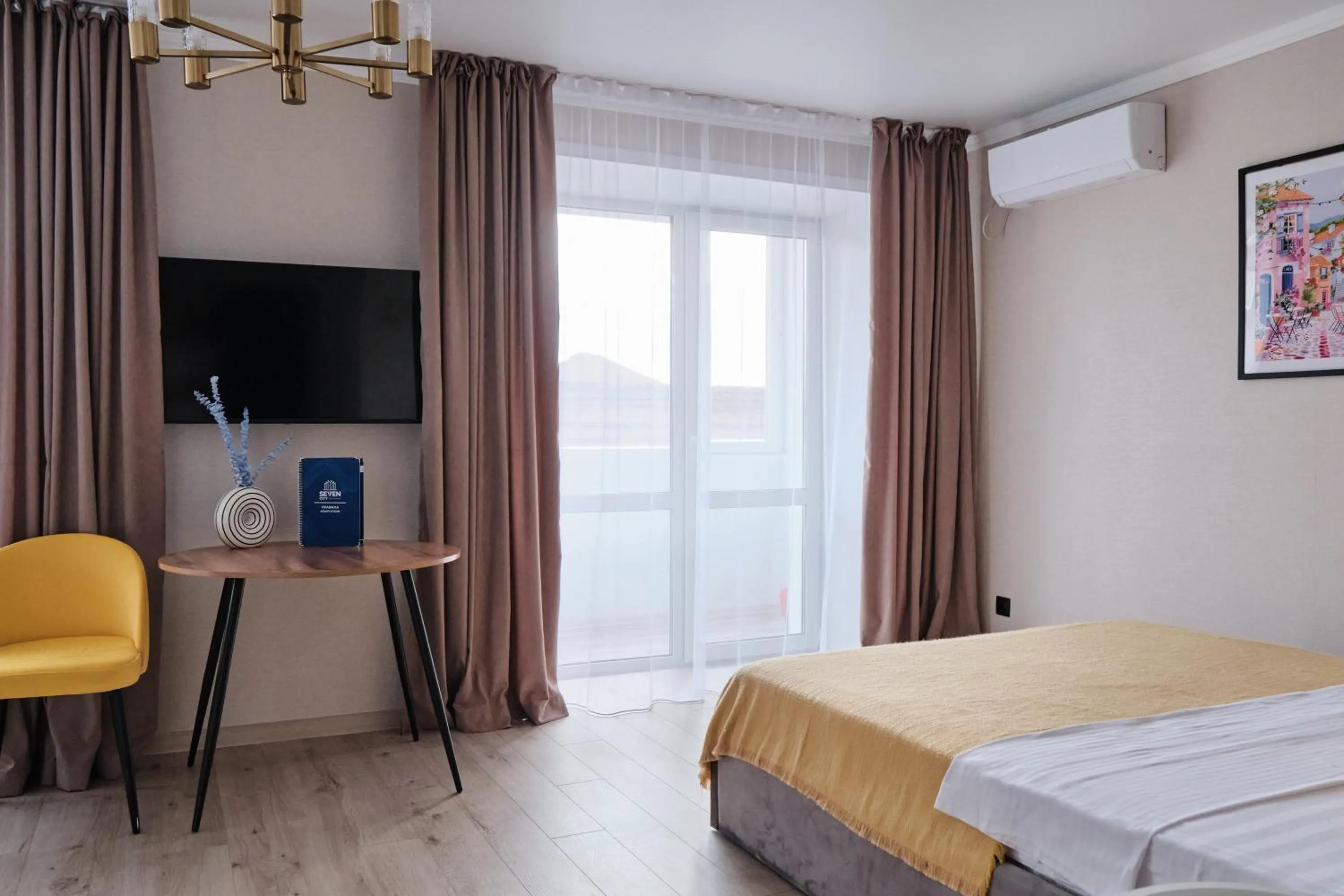 Bed in Seven City Apartments