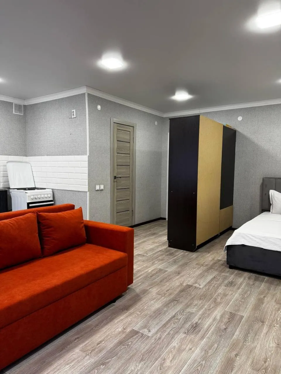 Bed in Seven City Apartments