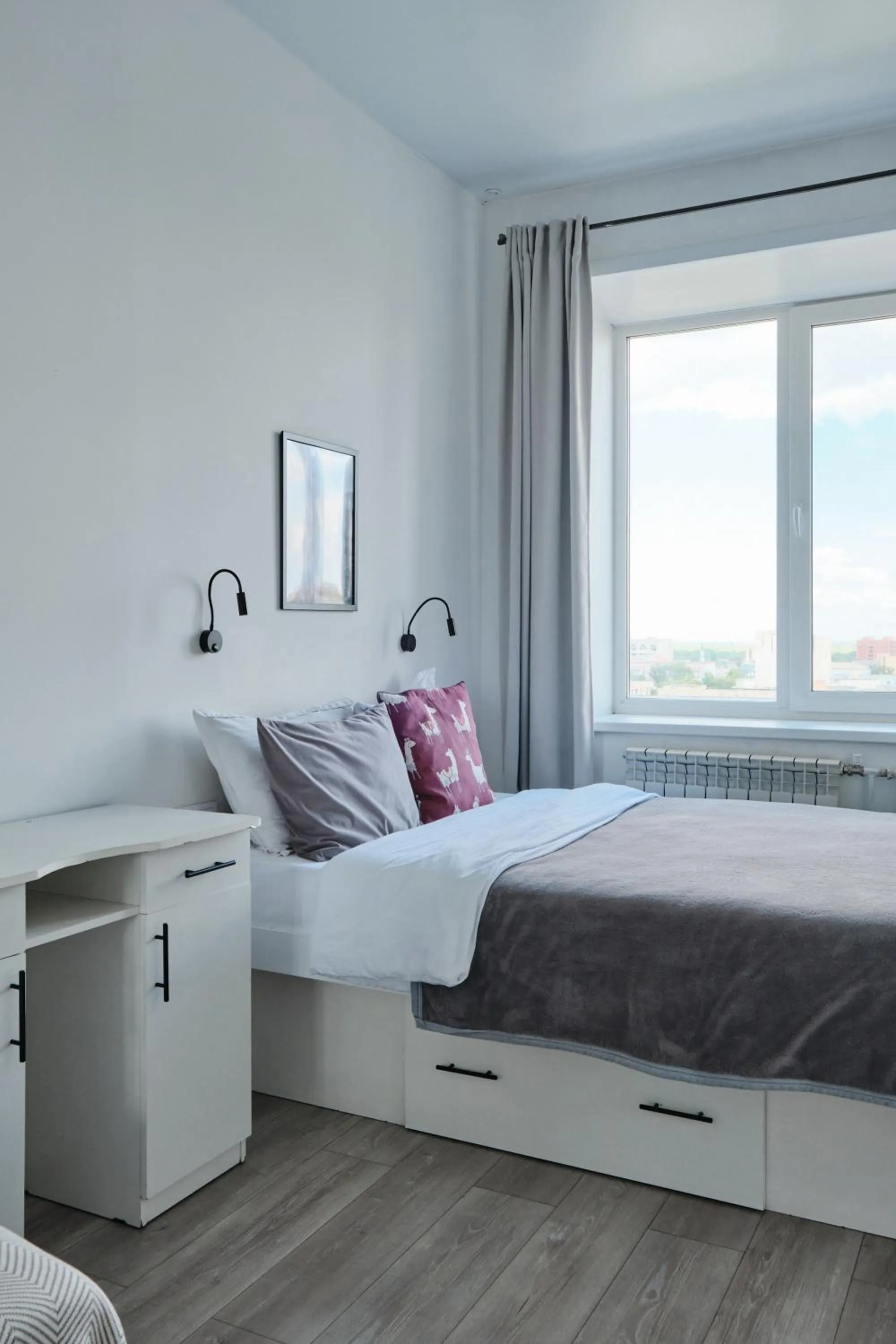 Bed in Seven City Apartments