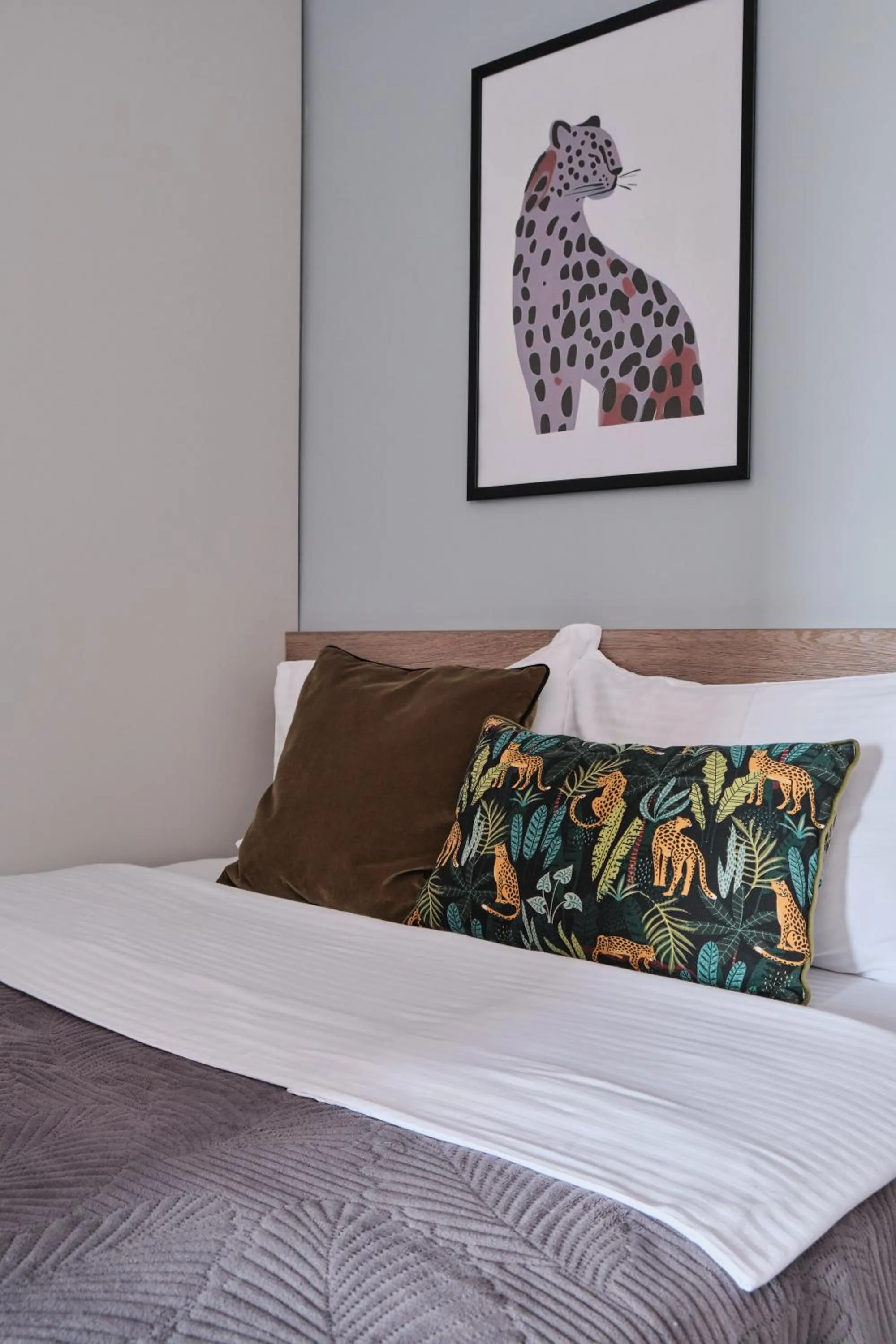 Bed in Seven City Apartments