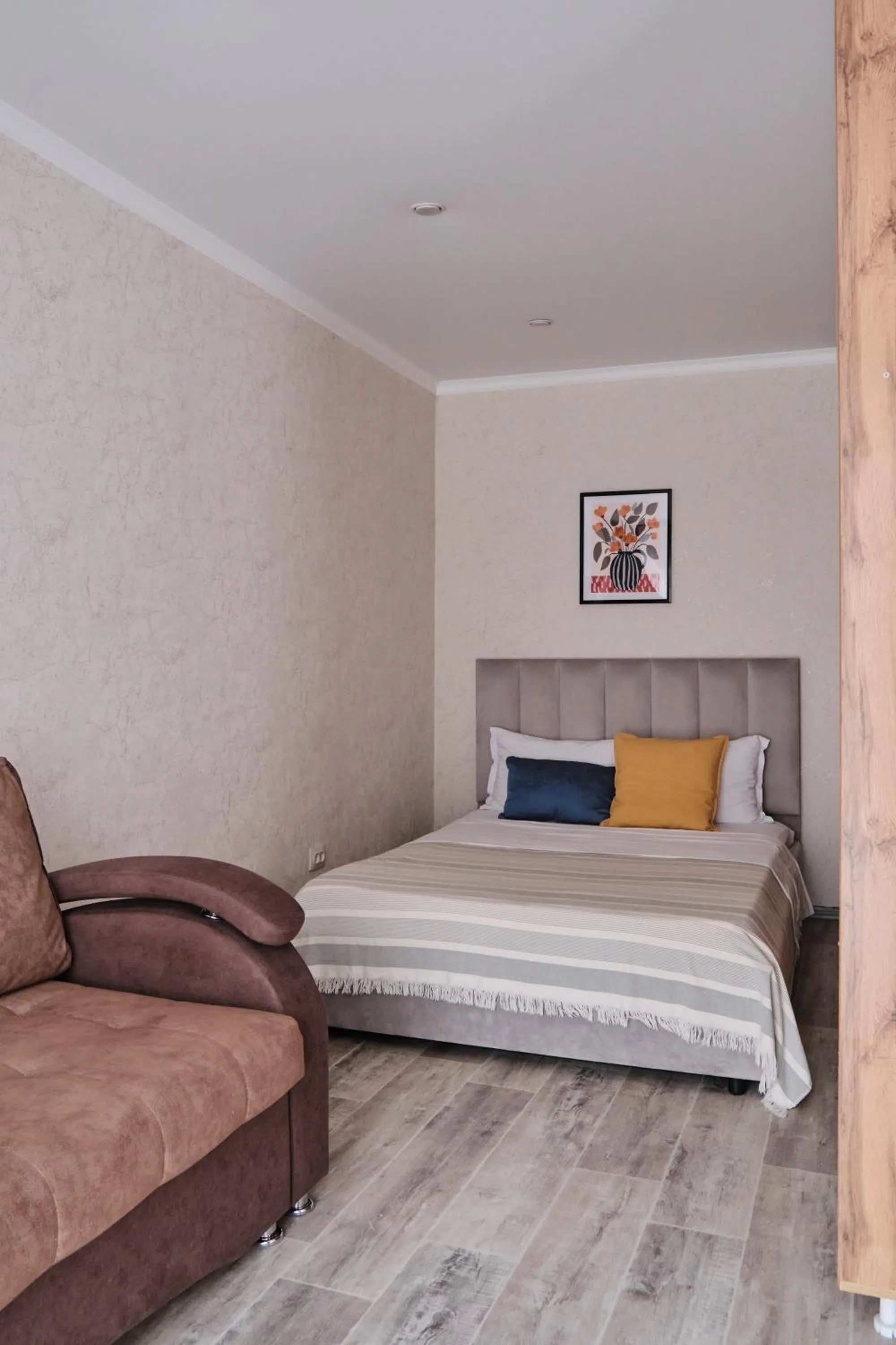 Bed in Seven City Apartments