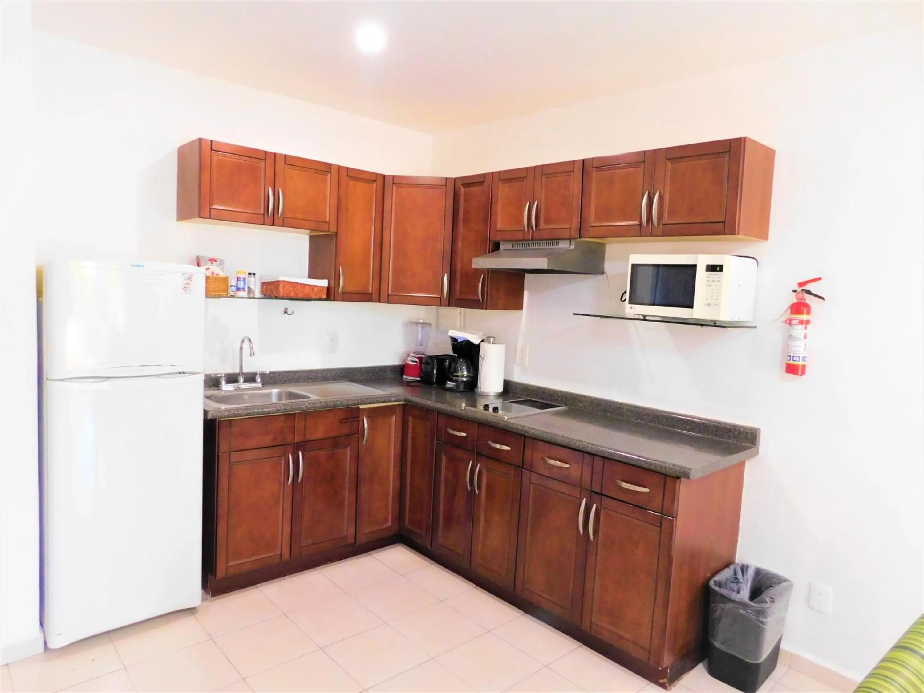 Kitchen or kitchenette in Nautibeach Beach Front Condos in North Beach