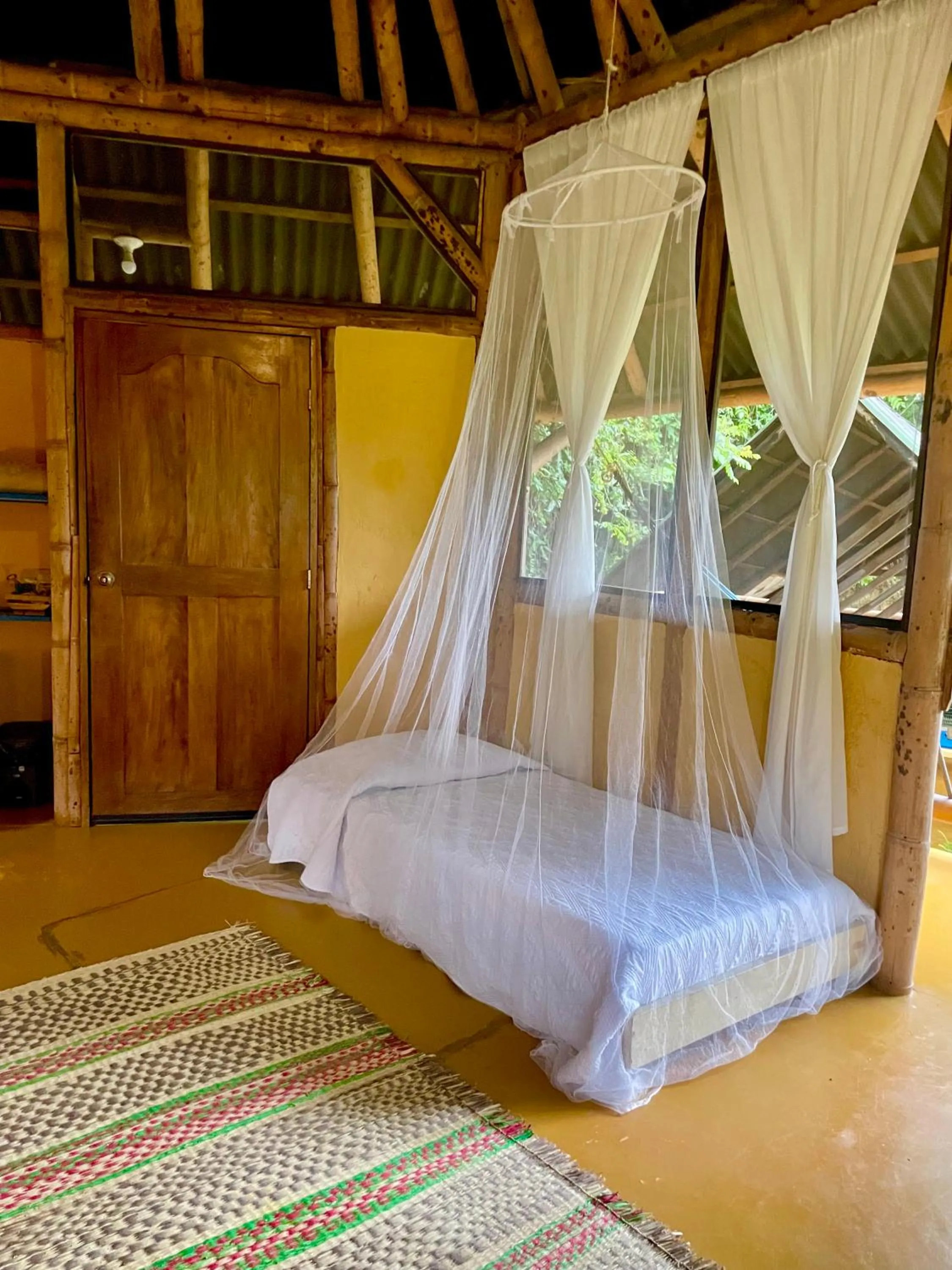 Bed in Minca Ecohabs Hotel