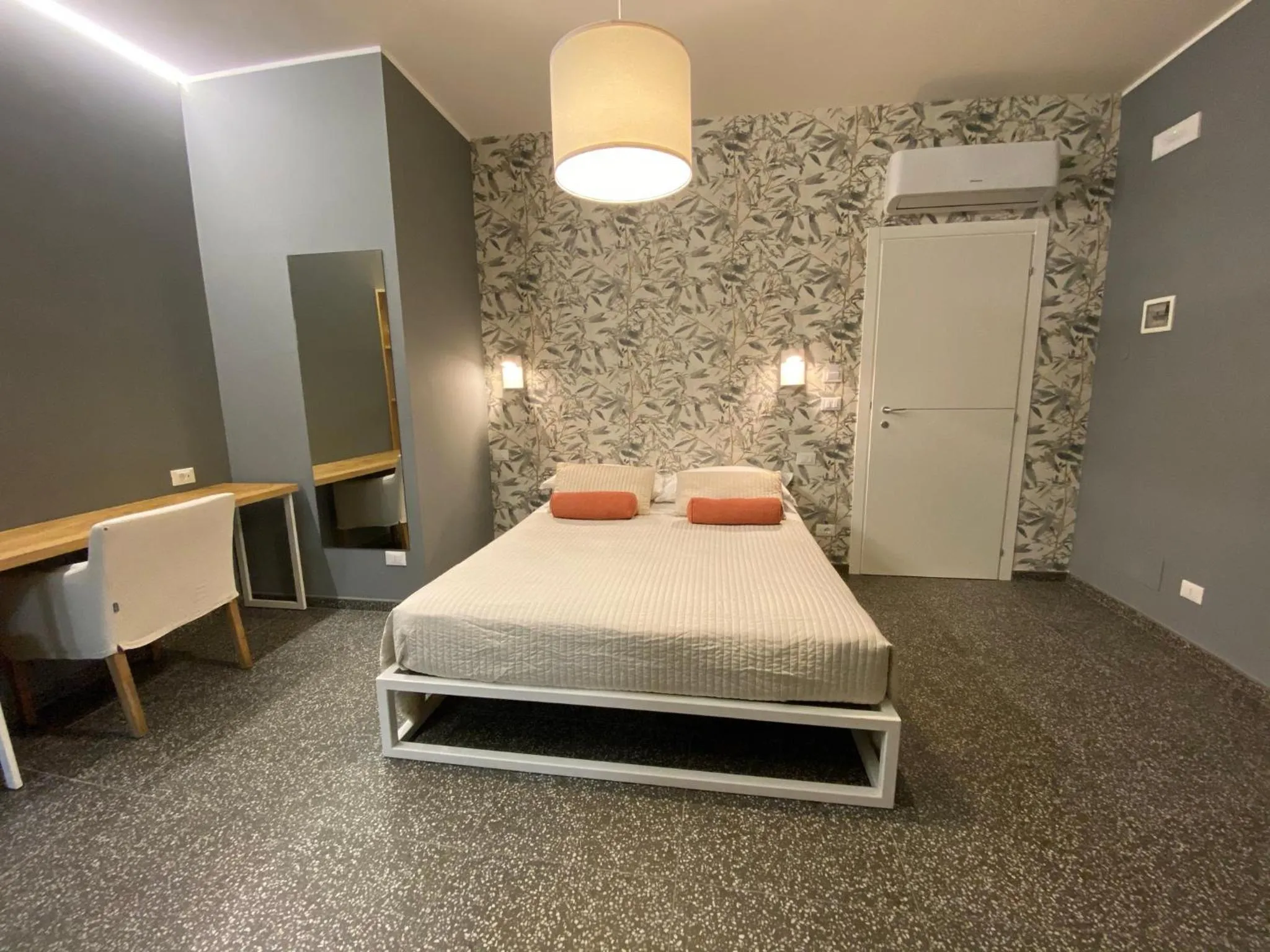 Bed in La Taverna Antica Rooms