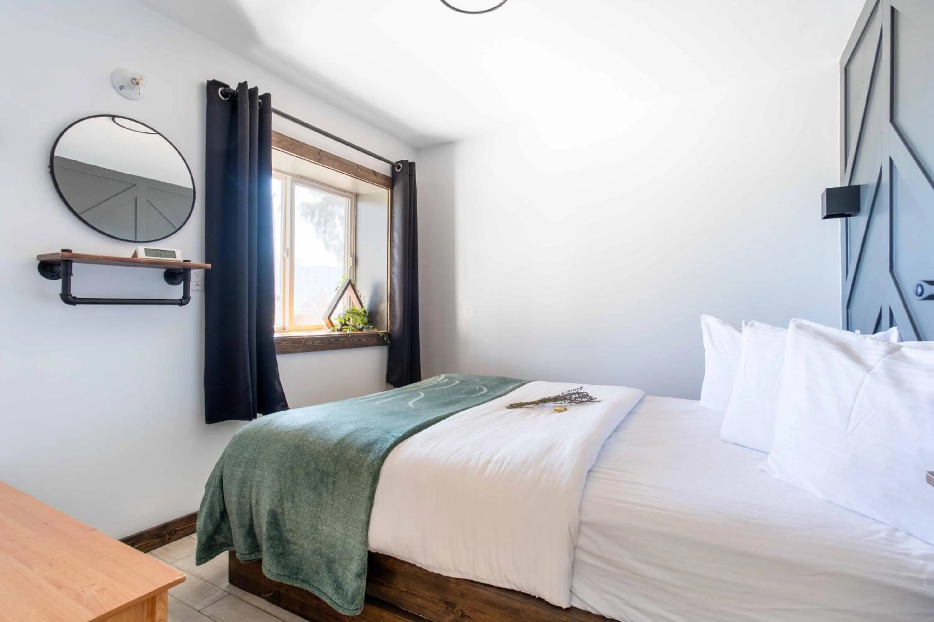 Bed in The Valley View Cabins and Event Center