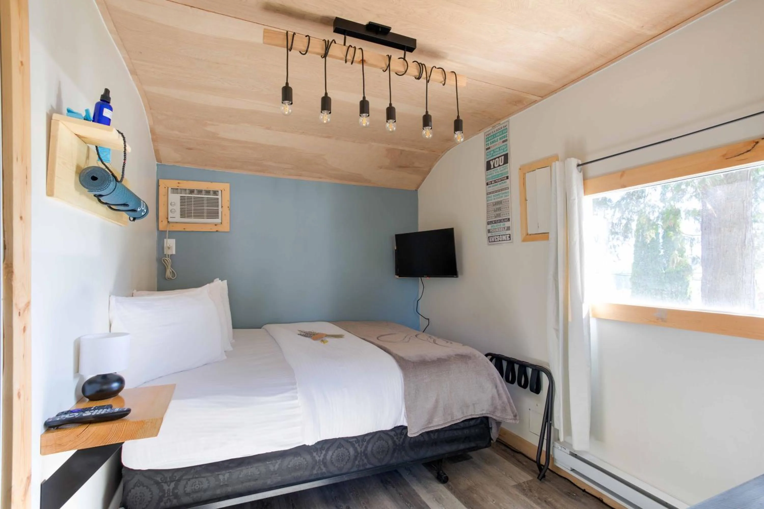 Bed in The Valley View Cabins and Event Center