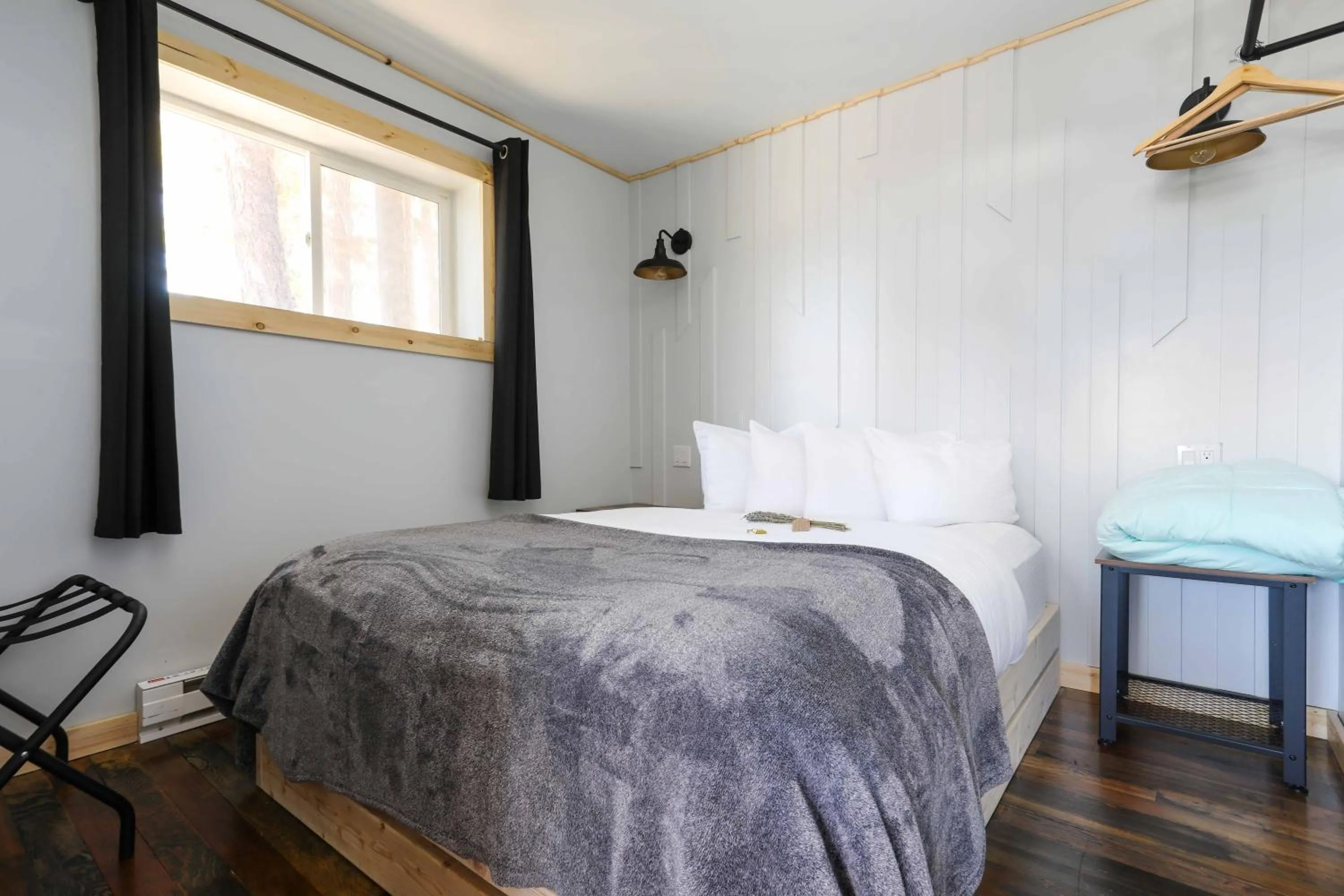 Bed in The Valley View Cabins and Event Center