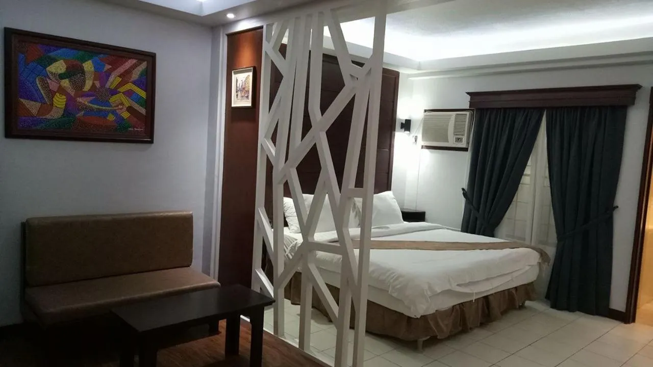 Bedroom, Bed in DM Residente Hotel Inns & Villas