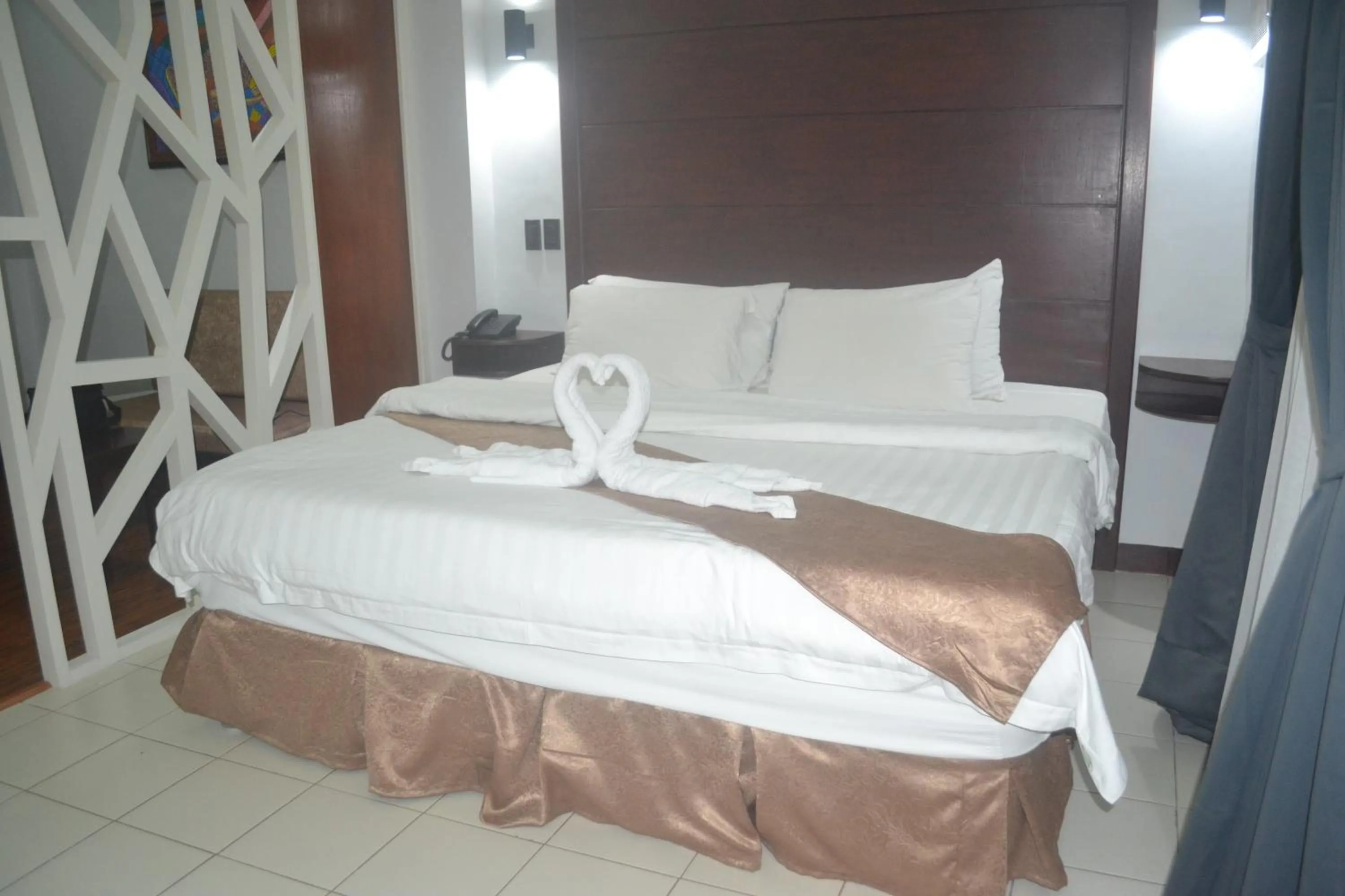 Bed in DM Residente Hotel Inns & Villas