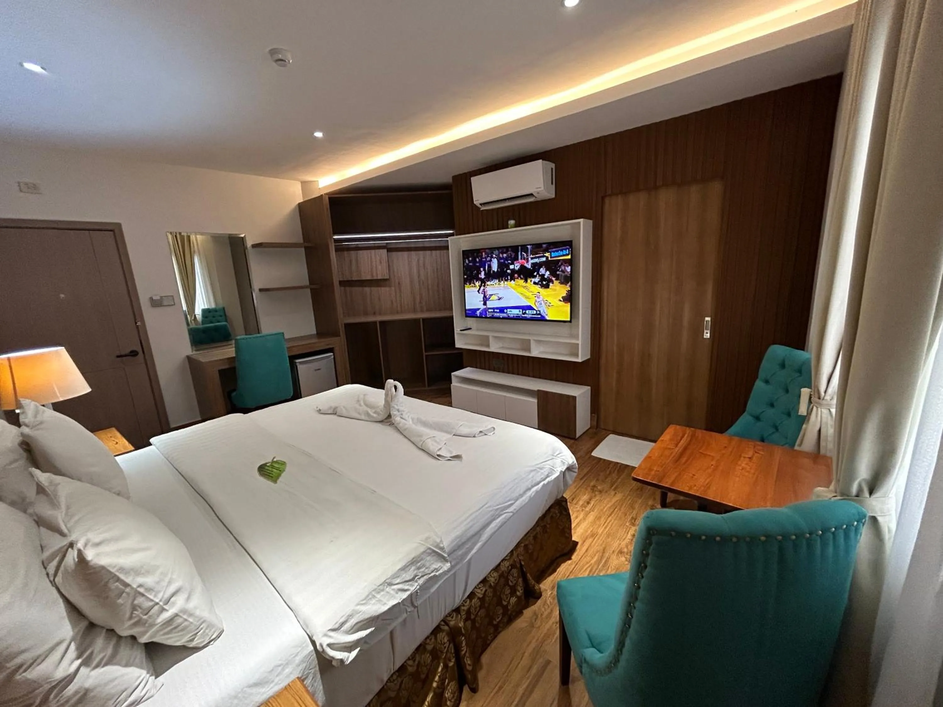 Bed in DM Residente Hotel Inns & Villas