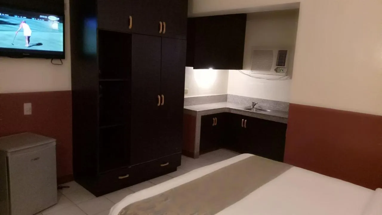 Bedroom in DM Residente Hotel Inns & Villas