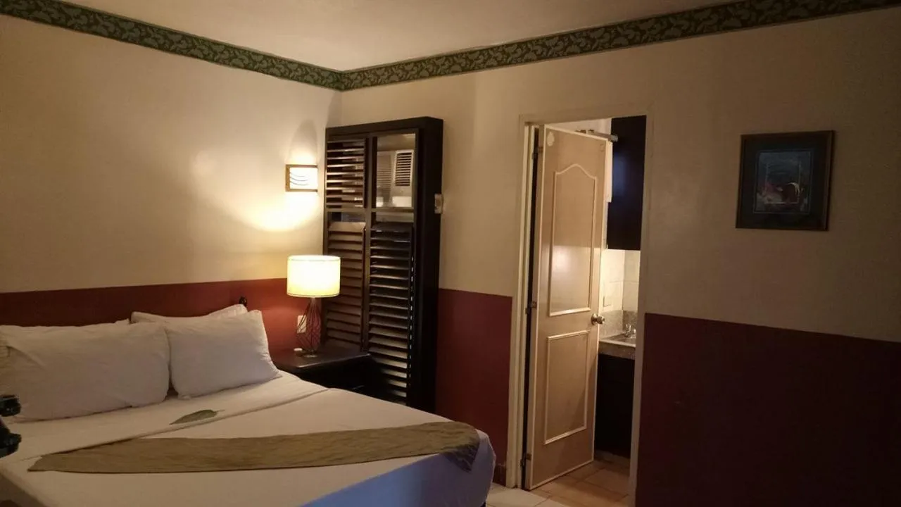 Bedroom, Bed in DM Residente Hotel Inns & Villas