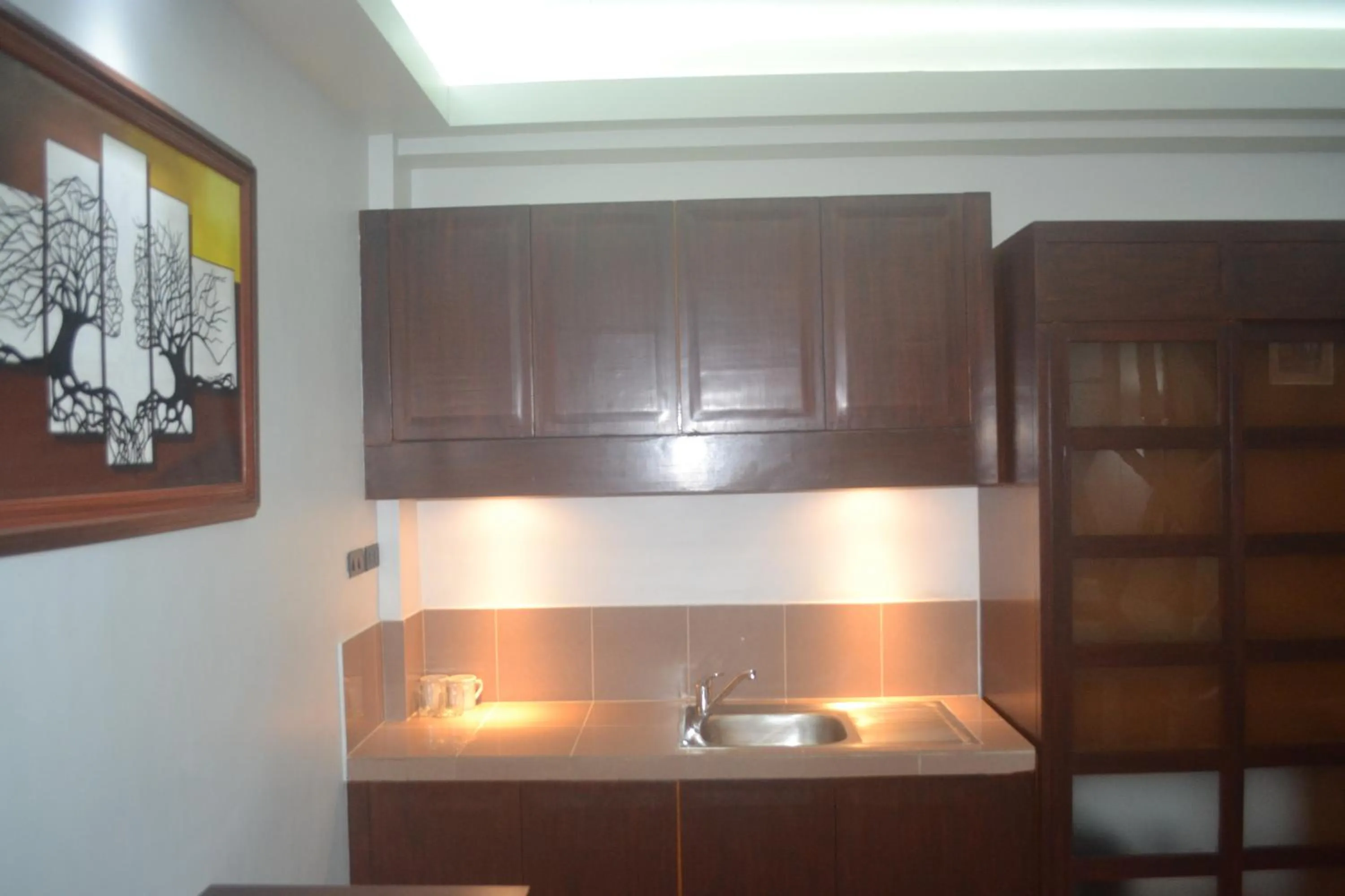 Kitchen or kitchenette in DM Residente Hotel Inns & Villas