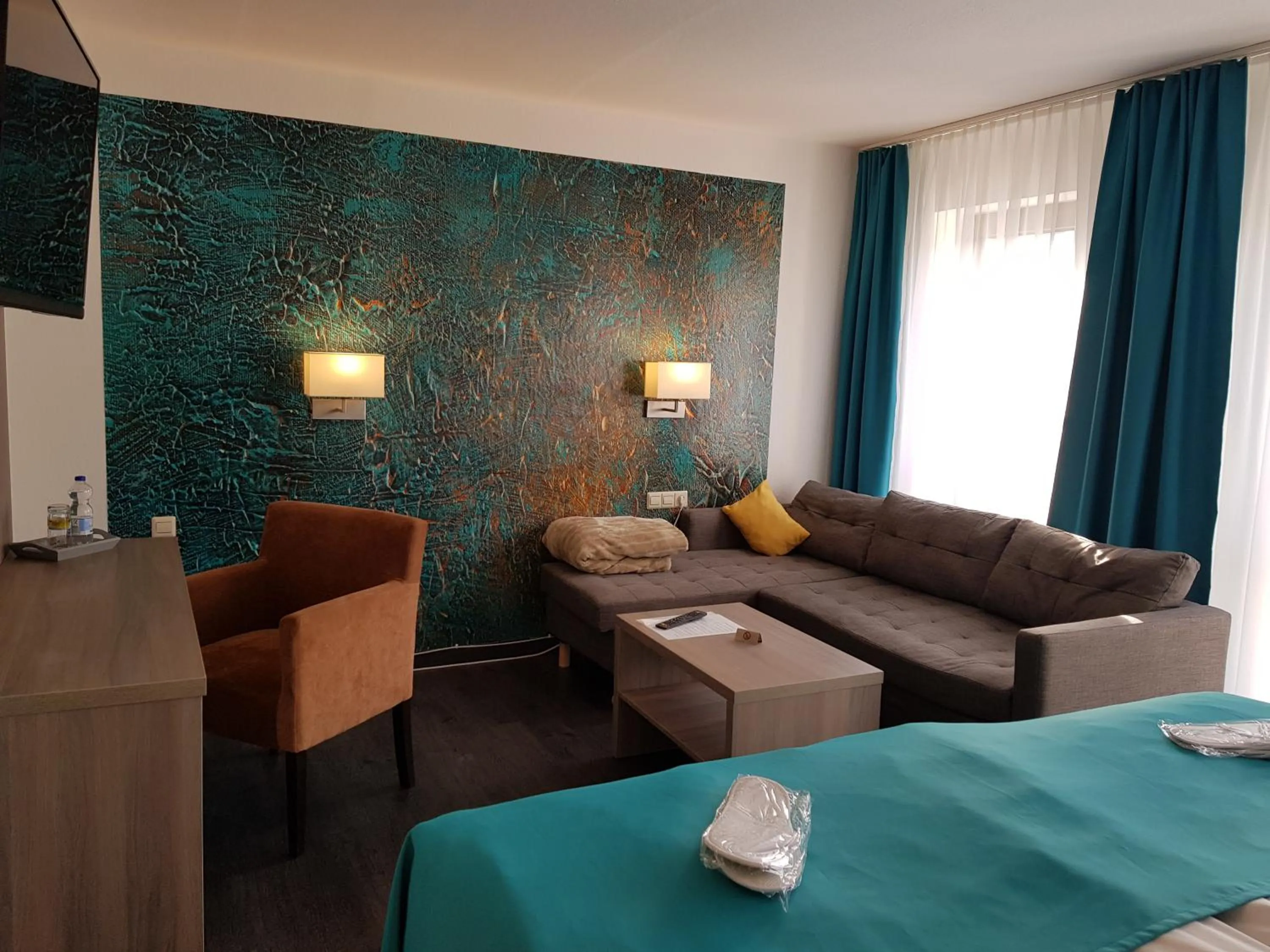 Seating area, Bed in Hotel Milin