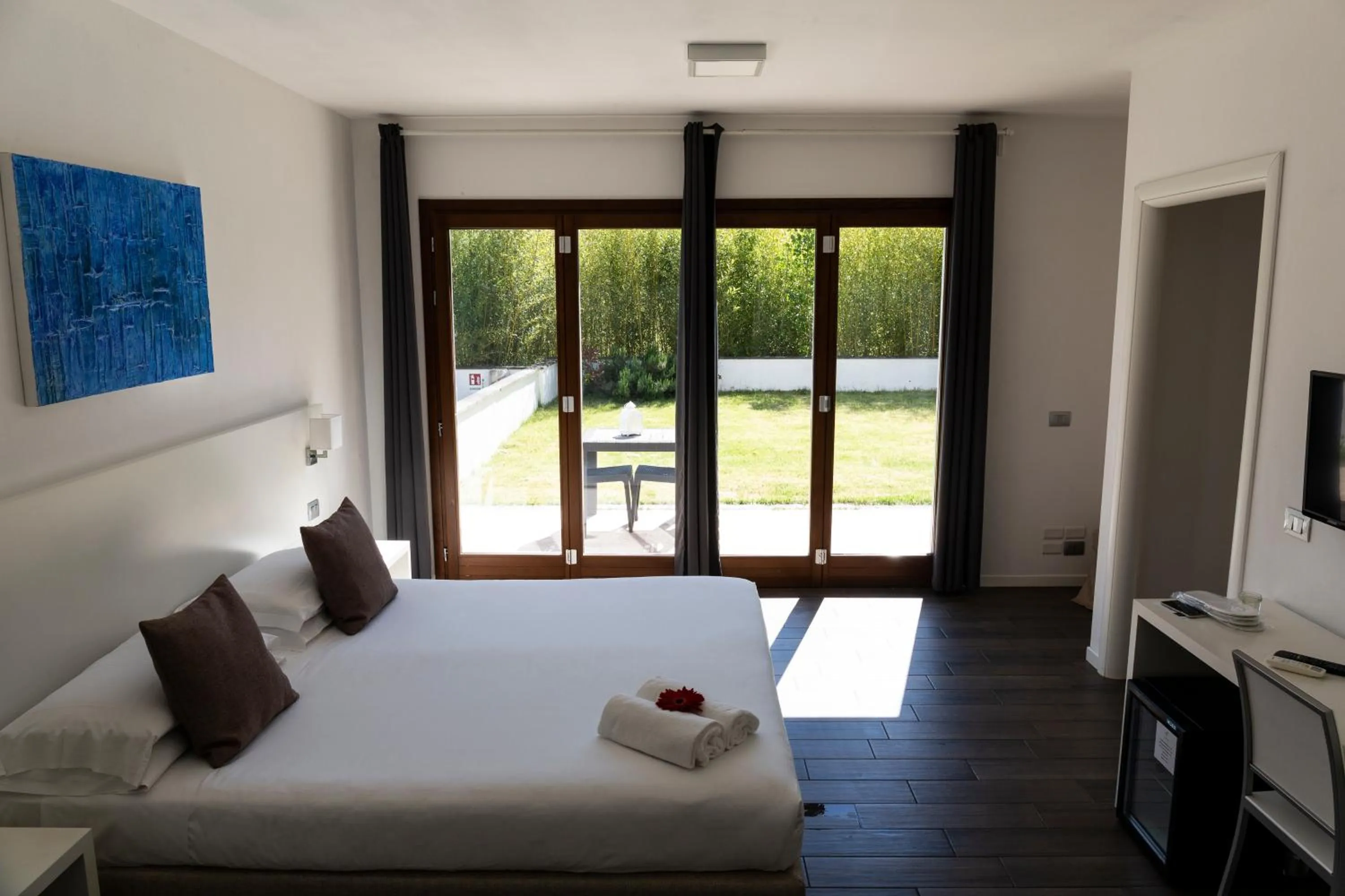 towels, Bed in The Florence Hills Resort & Wellness