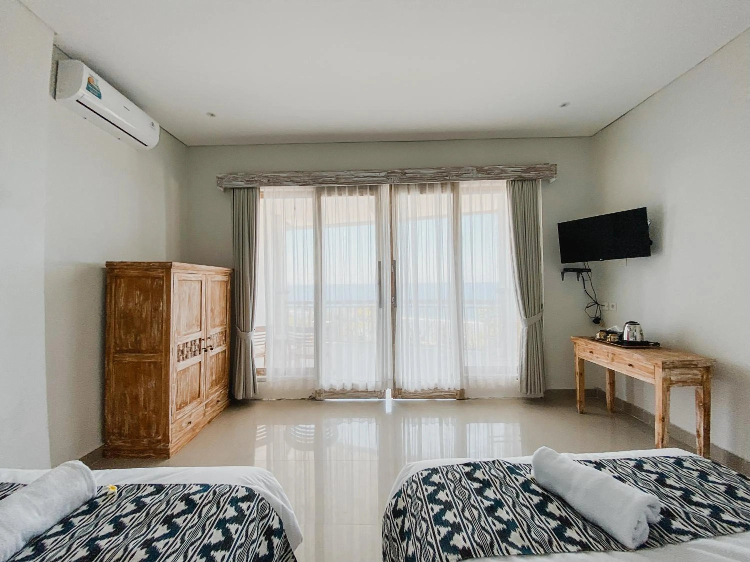 Communal lounge/ TV room, Bed in Permata Hill Nusa Penida