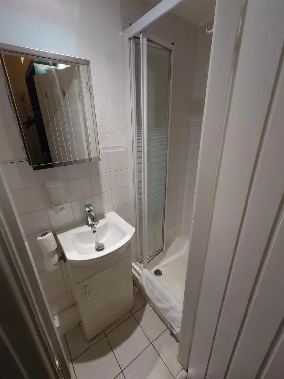 Bathroom in High Tide Hotel Oyo