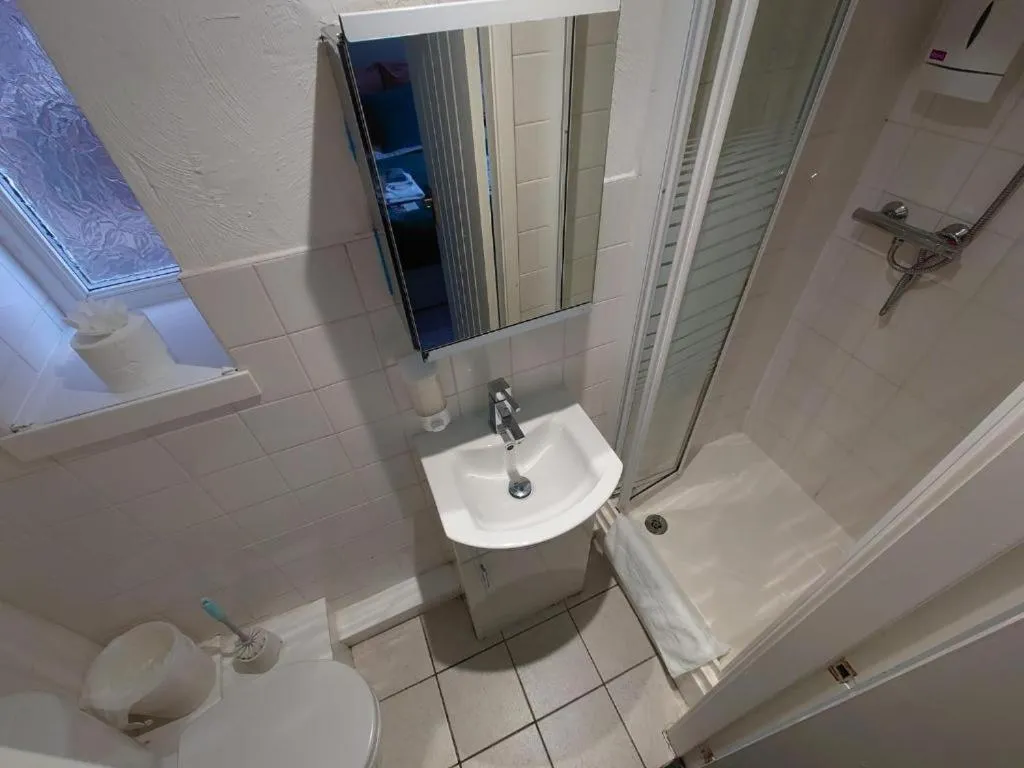 Bathroom in High Tide Hotel Oyo