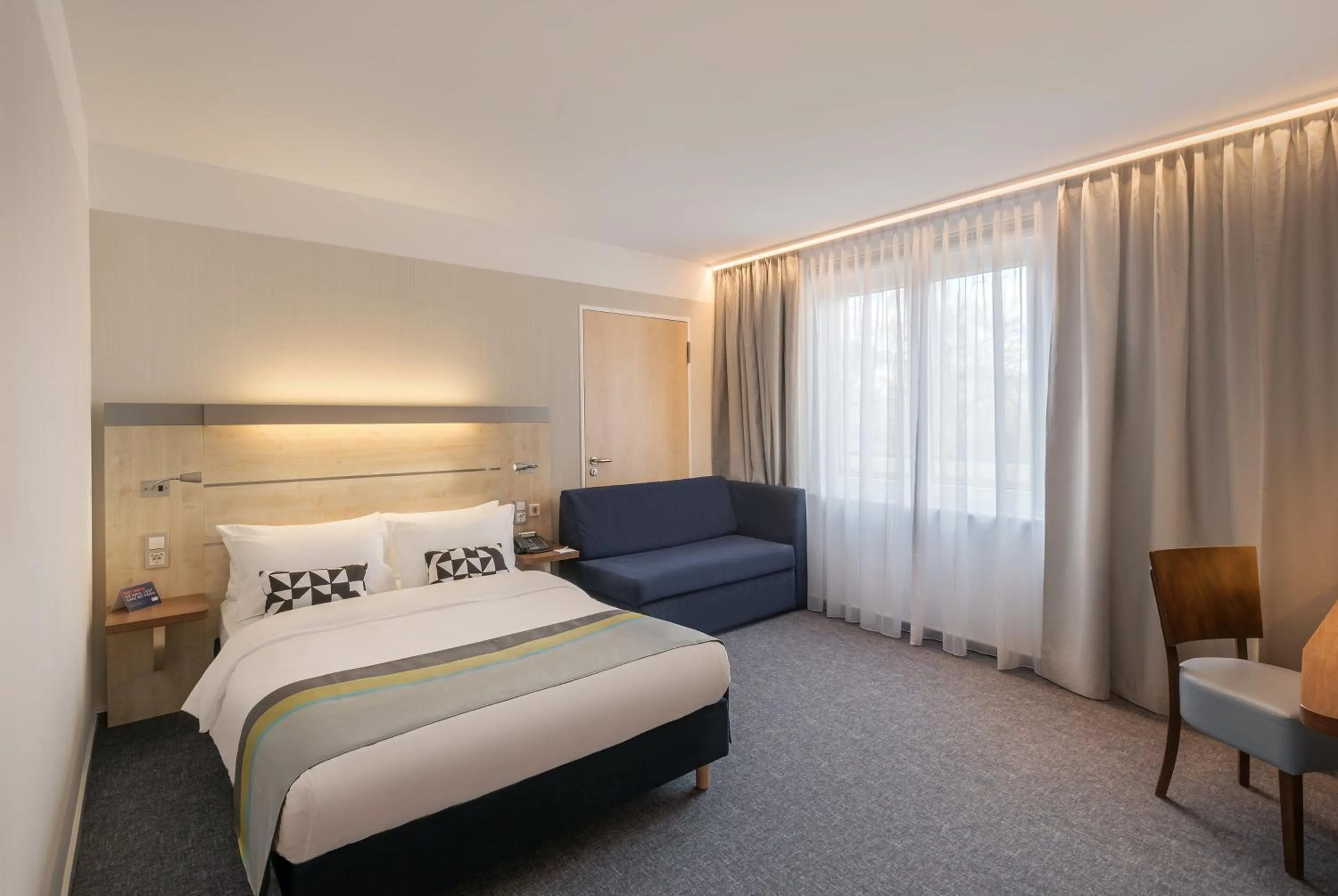 Photo of the whole room, Bed in Holiday Inn Express Singen by IHG