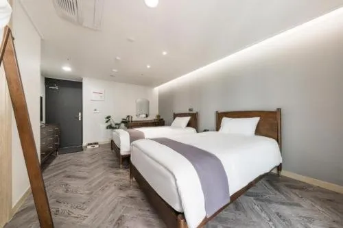 Bed in Haeundae Central Hotel