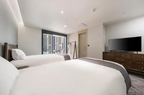 Bed in Haeundae Central Hotel