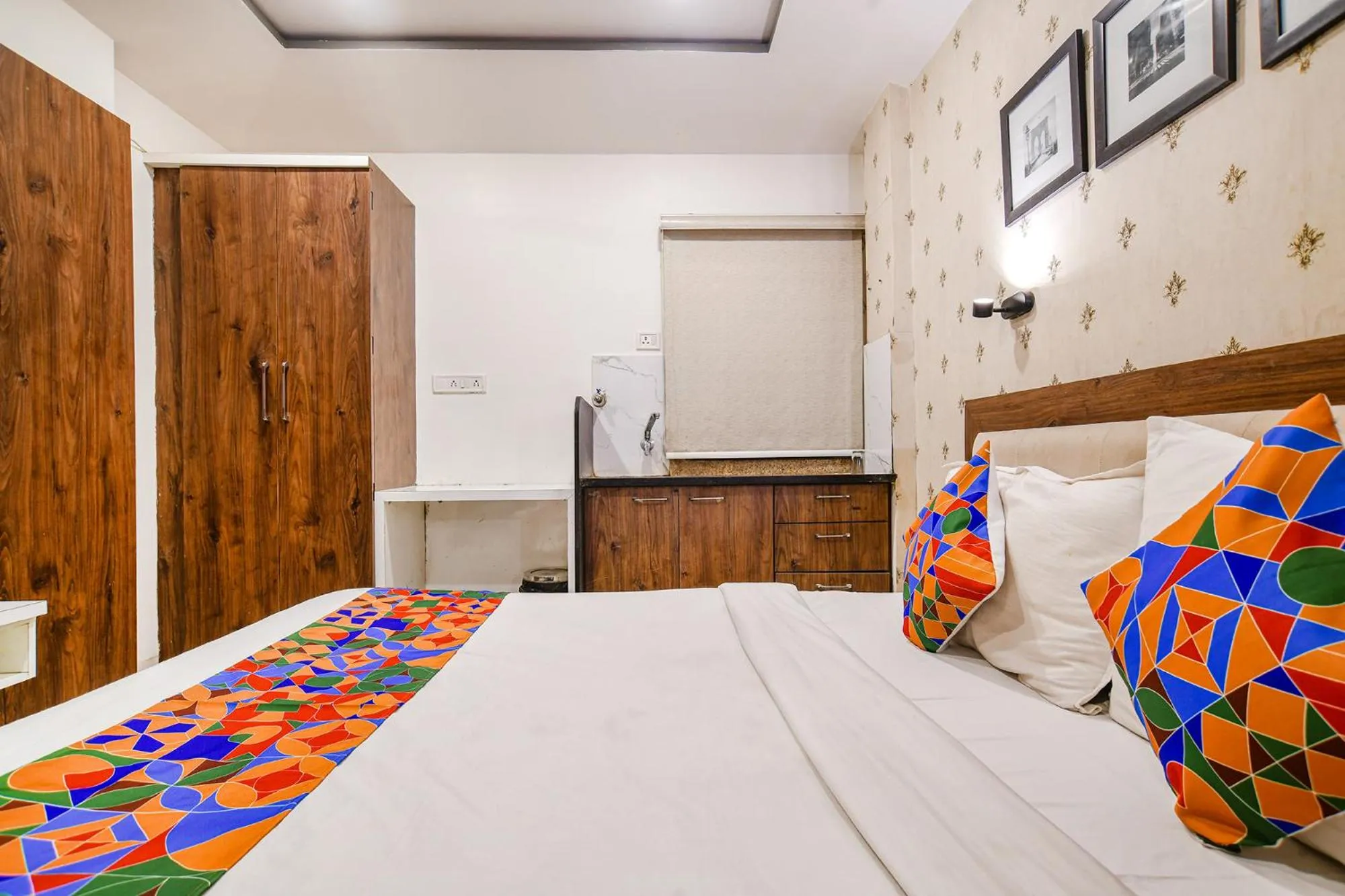 Bed in FabHotel Shree Ram Palace