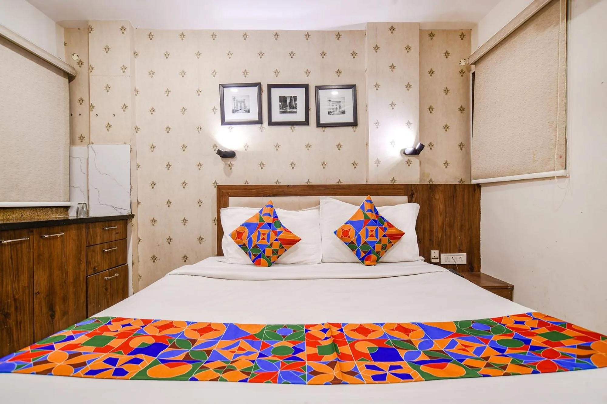 Bed in FabHotel Shree Ram Palace